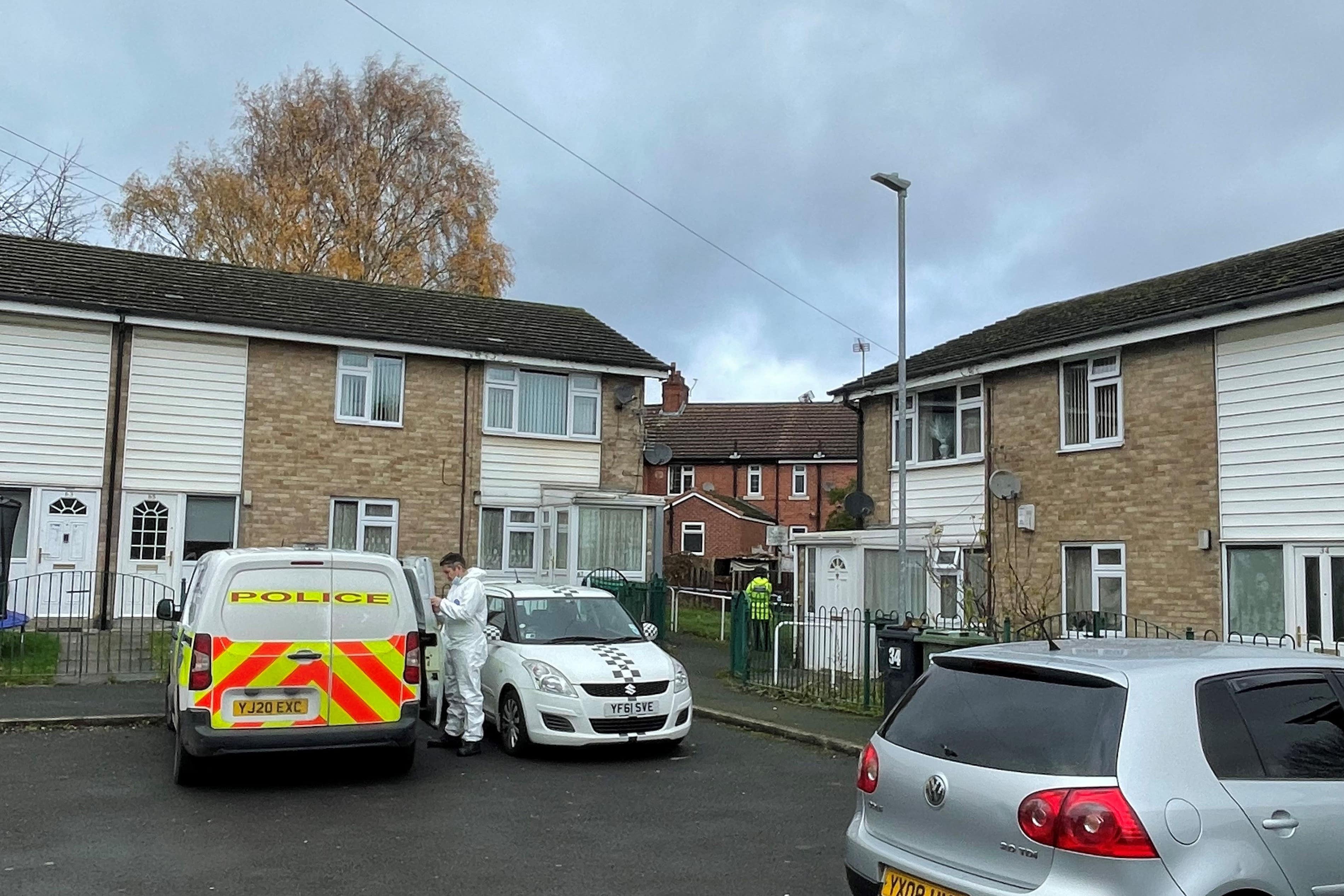 Police near Victoria Street in Ravensthorpe, where witnesses saw a man arrested (Dave Higgens/PA)