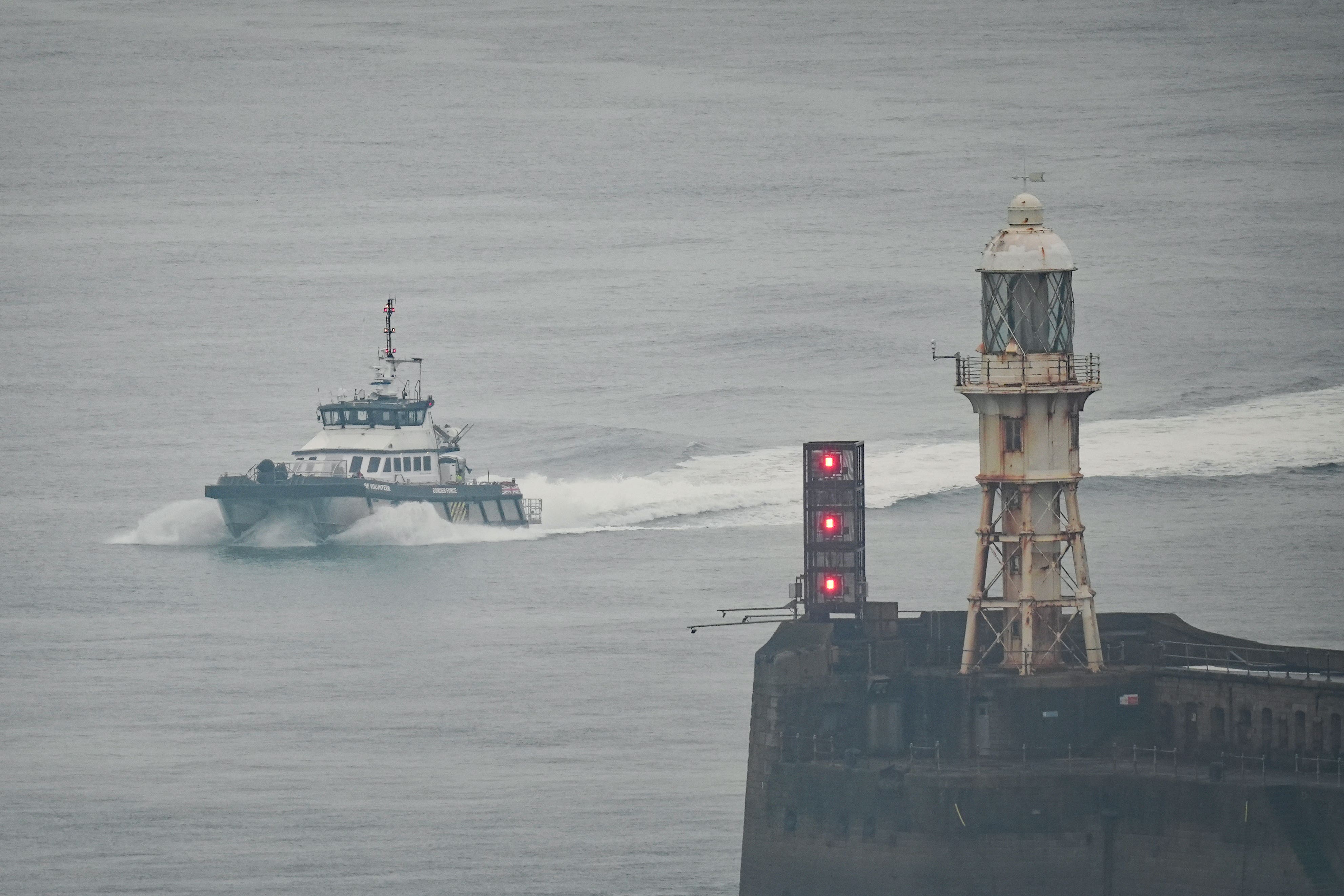 A group of people thought to be migrants are brought in to Dover, Kent (Gareth Fuller/PA)