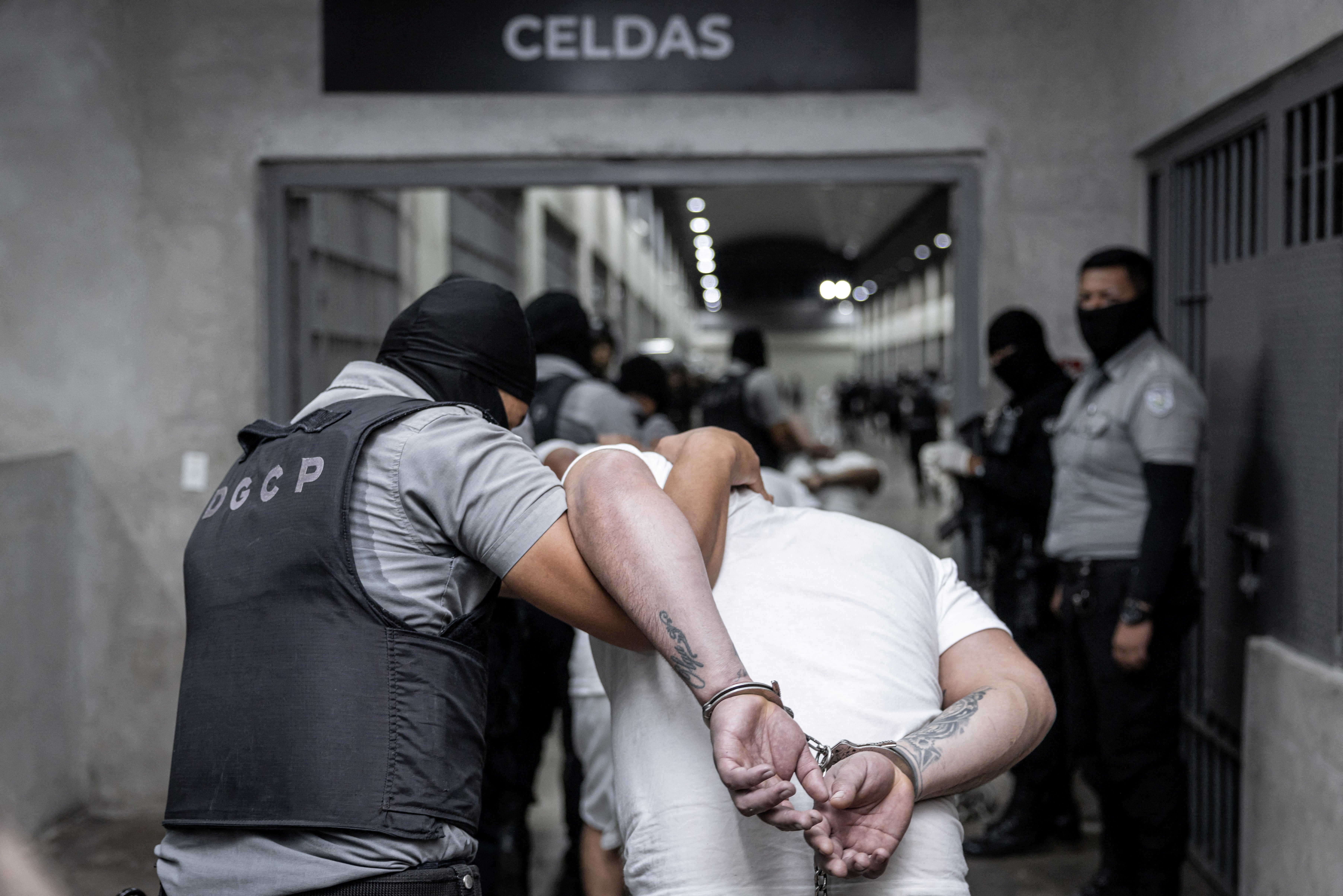 Images from El Salvador’s government show Venezuelan men deported from the United States under the Alien Enemies Act on March 15 being led into a Salvadoran prison in handcuffs