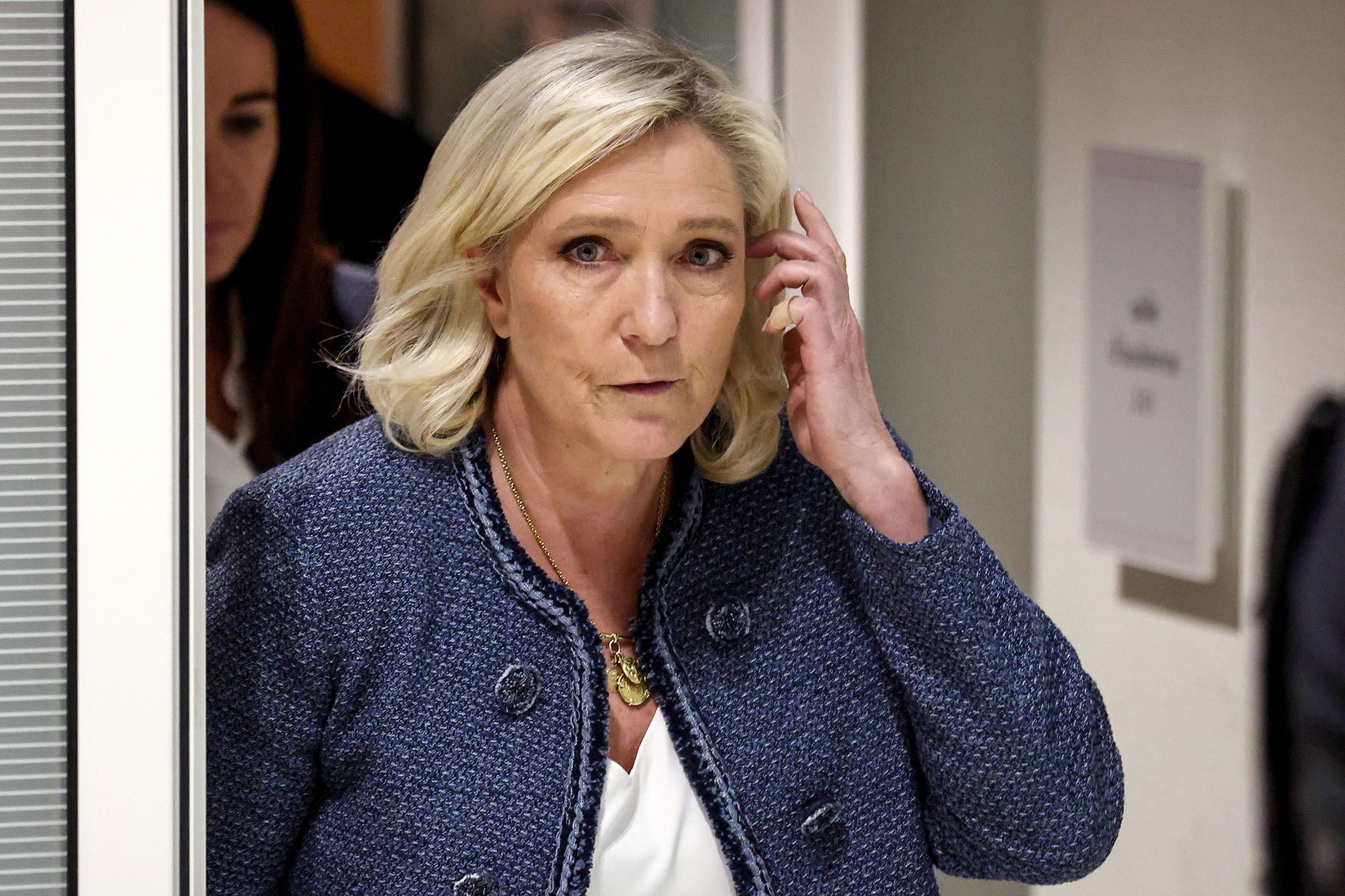 Marine Le Pen storms out of the courtroom before the judge finished reading her sentence