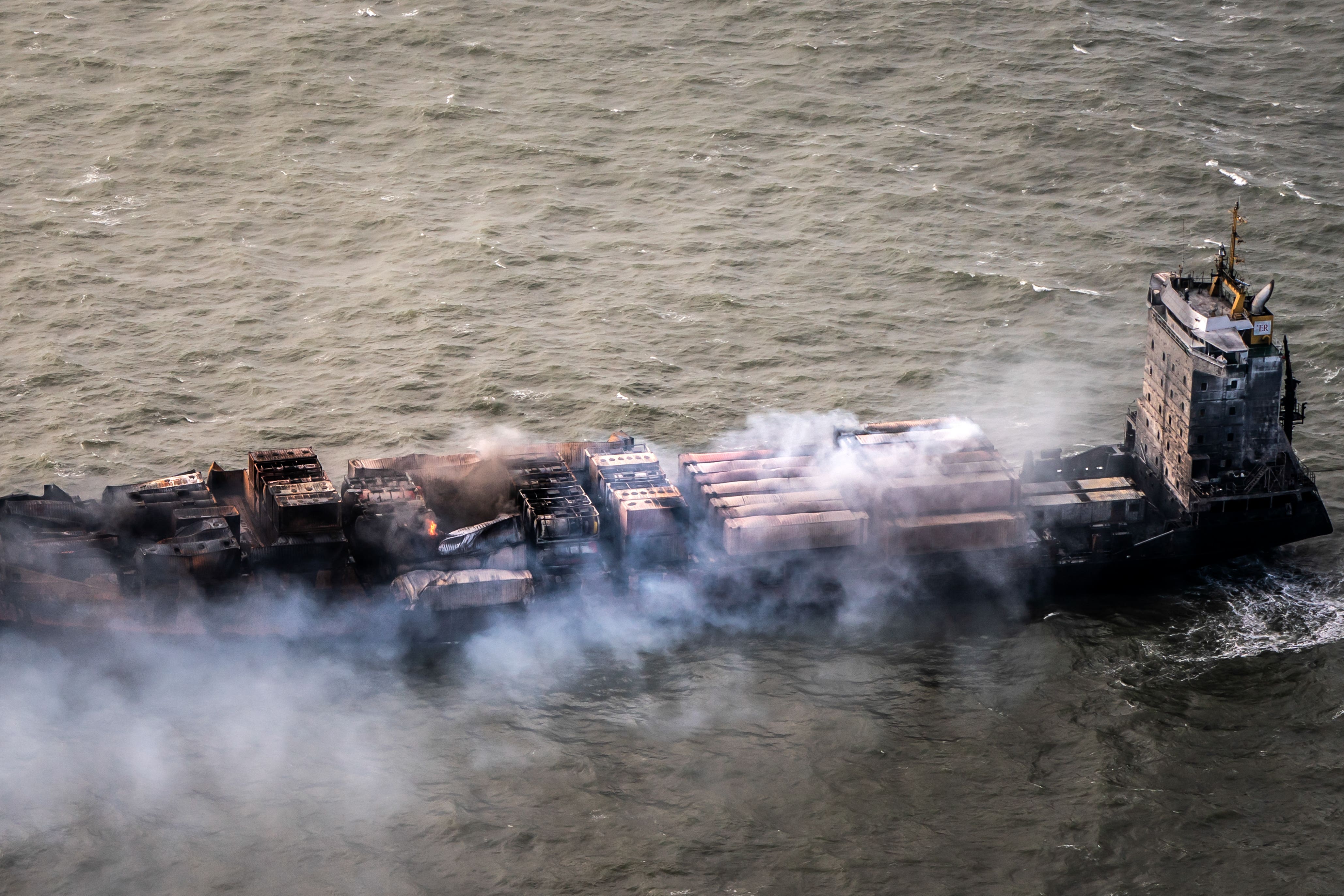 The Solong container ship off the coast of East Yorkshire following the collision with the MV Stena Immaculate oil tanker (Danny Lawson/PA)