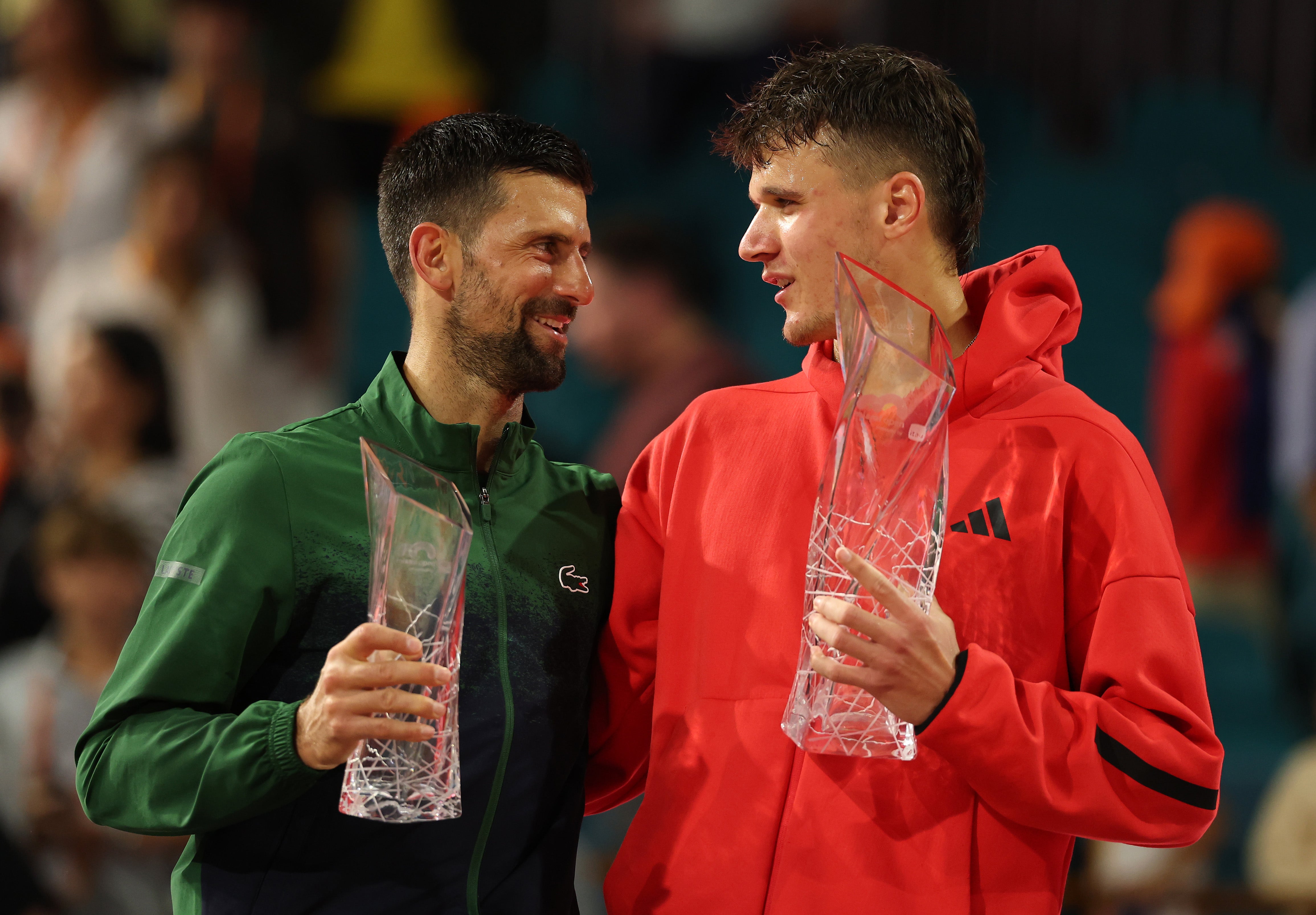 Mensik (right) defeated Djokovic at the Miami Open to deny the Serb a 100th tour title