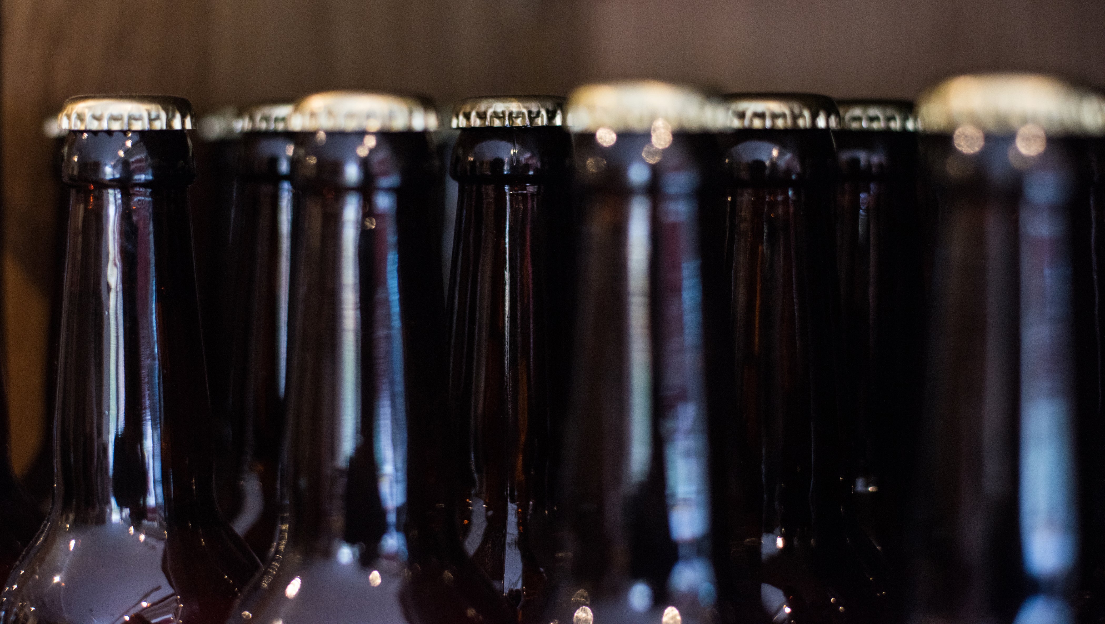 Bottled at the source, taxed at the shelf: Brewers warn the glass levy could put a squeeze on your next pint, too