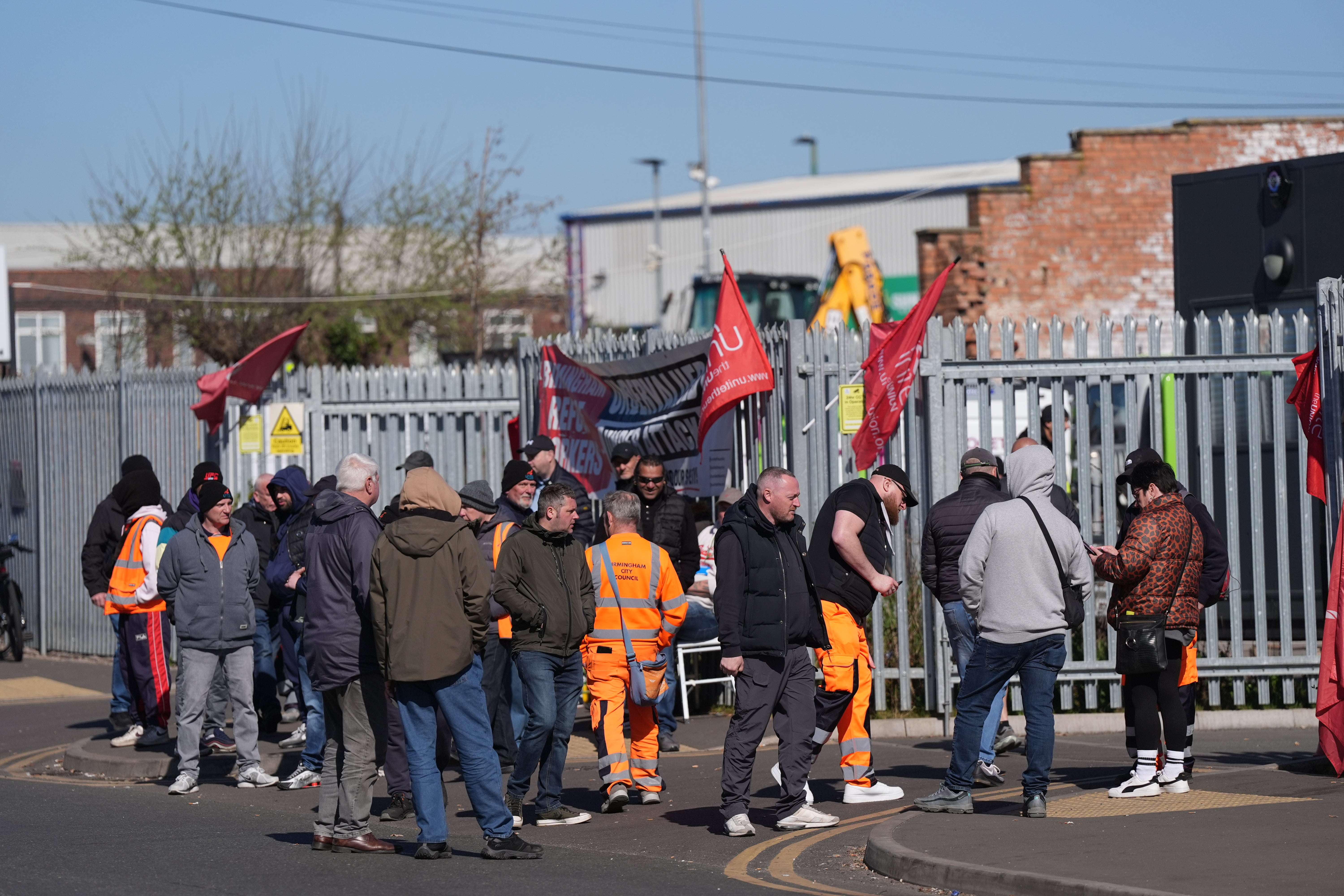 Members of the Unite union on the picket line in Tyseley, Birmingham, on Tuesday