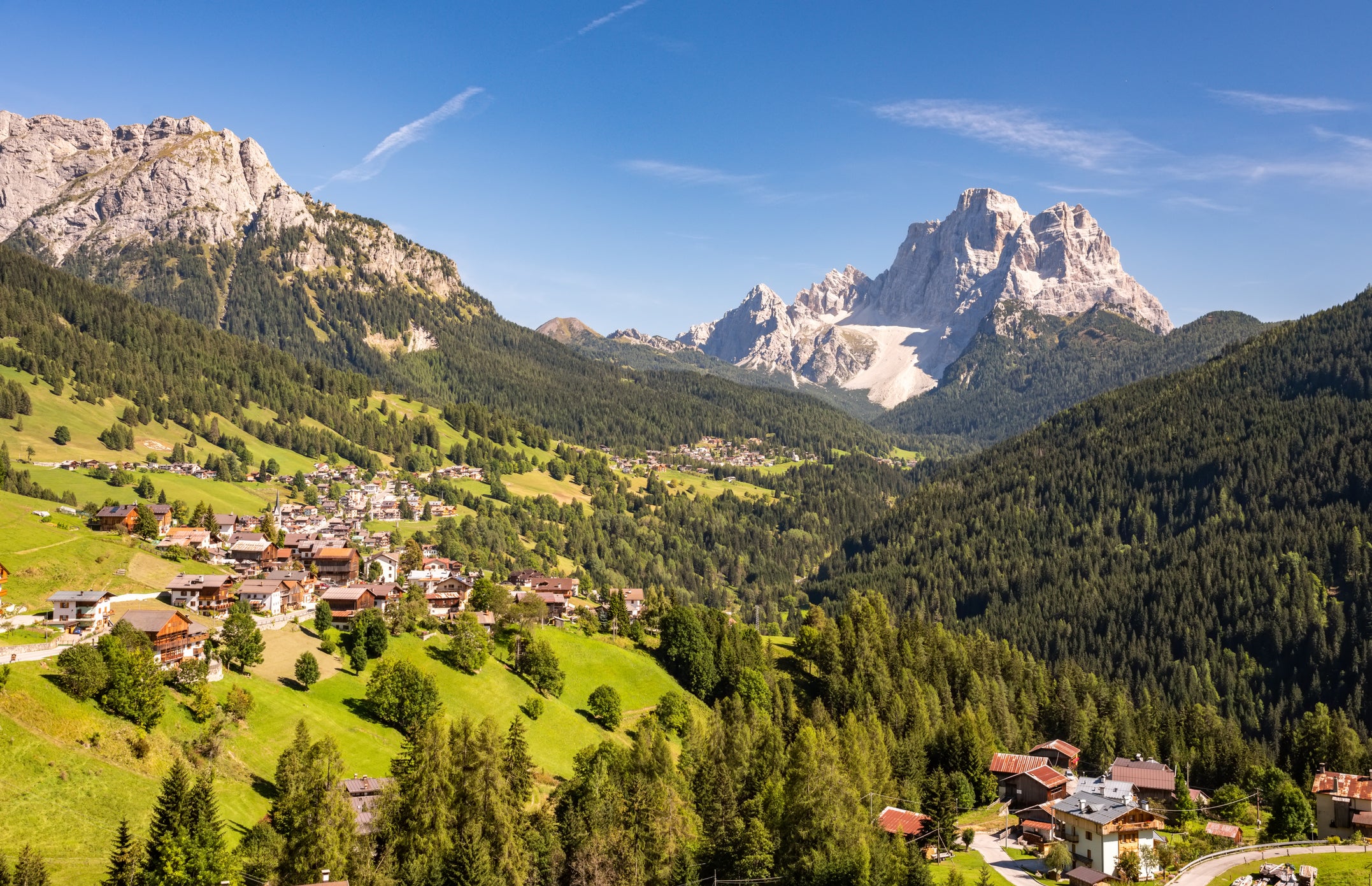 A typical summer village landscape in Dolomites, Italy