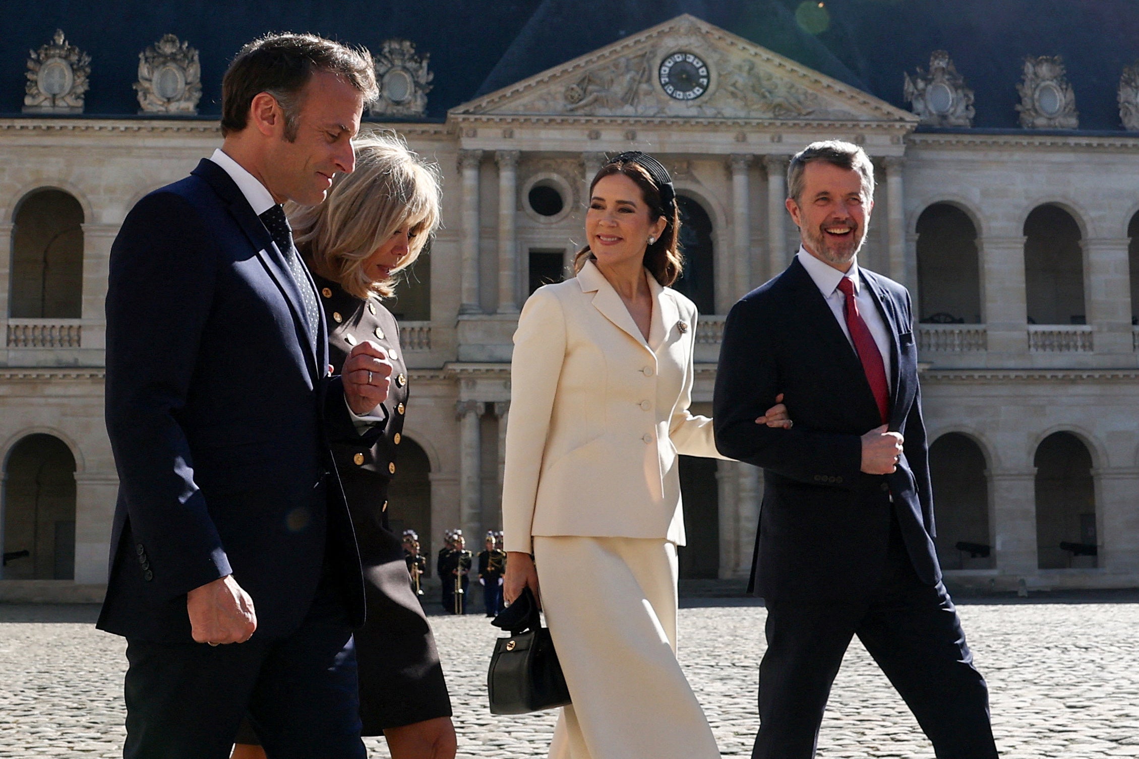 France's President Emmanuel Macron , his wife Brigitte Macron , Denmark's King Frederik X and his wife Denmark's Queen Mary at an official welcome ceremony for their state visit in Paris