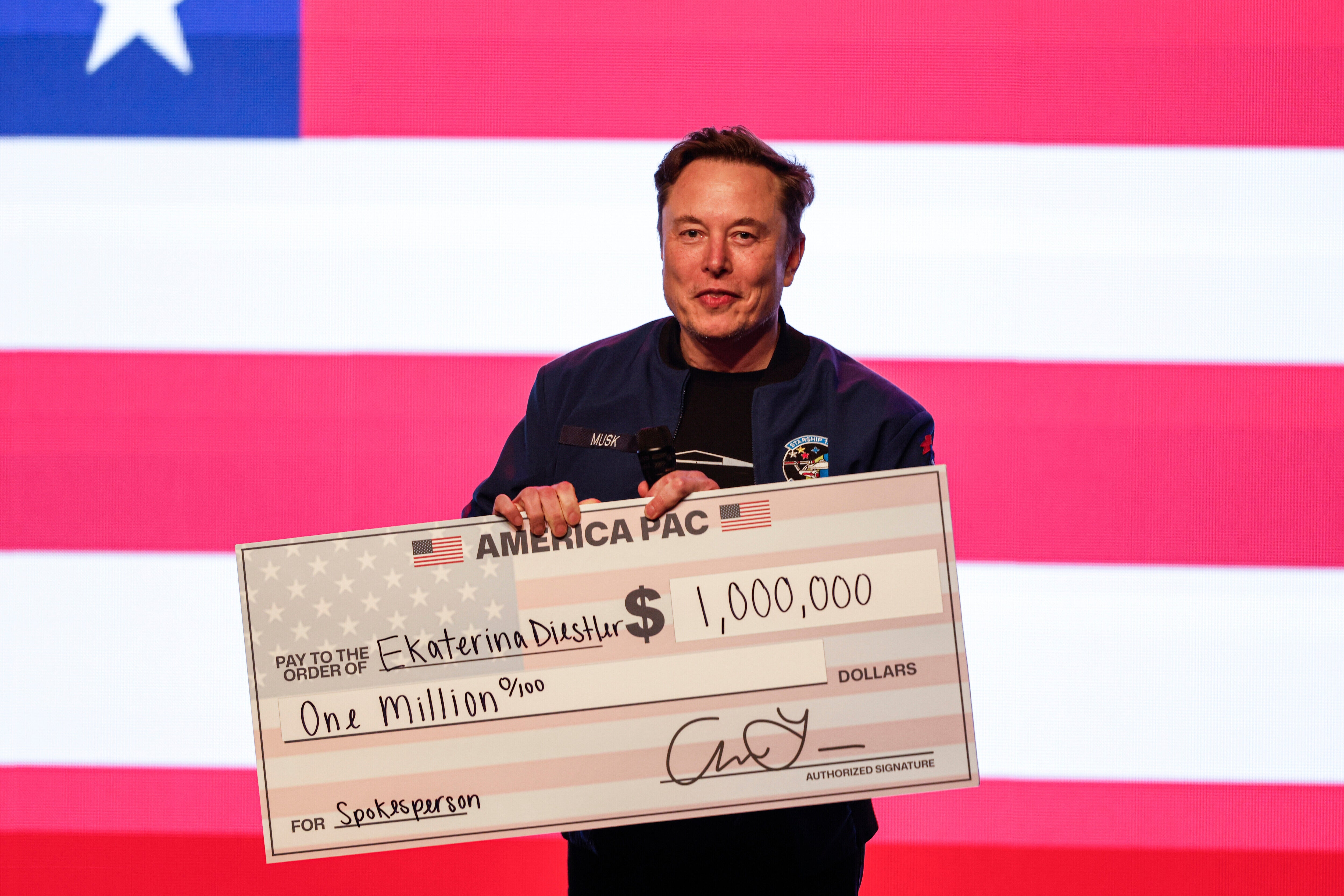 Elon Musk gives away a million-dollar check ahead of the Wisconsin Supreme Court election, which his candidate lost.