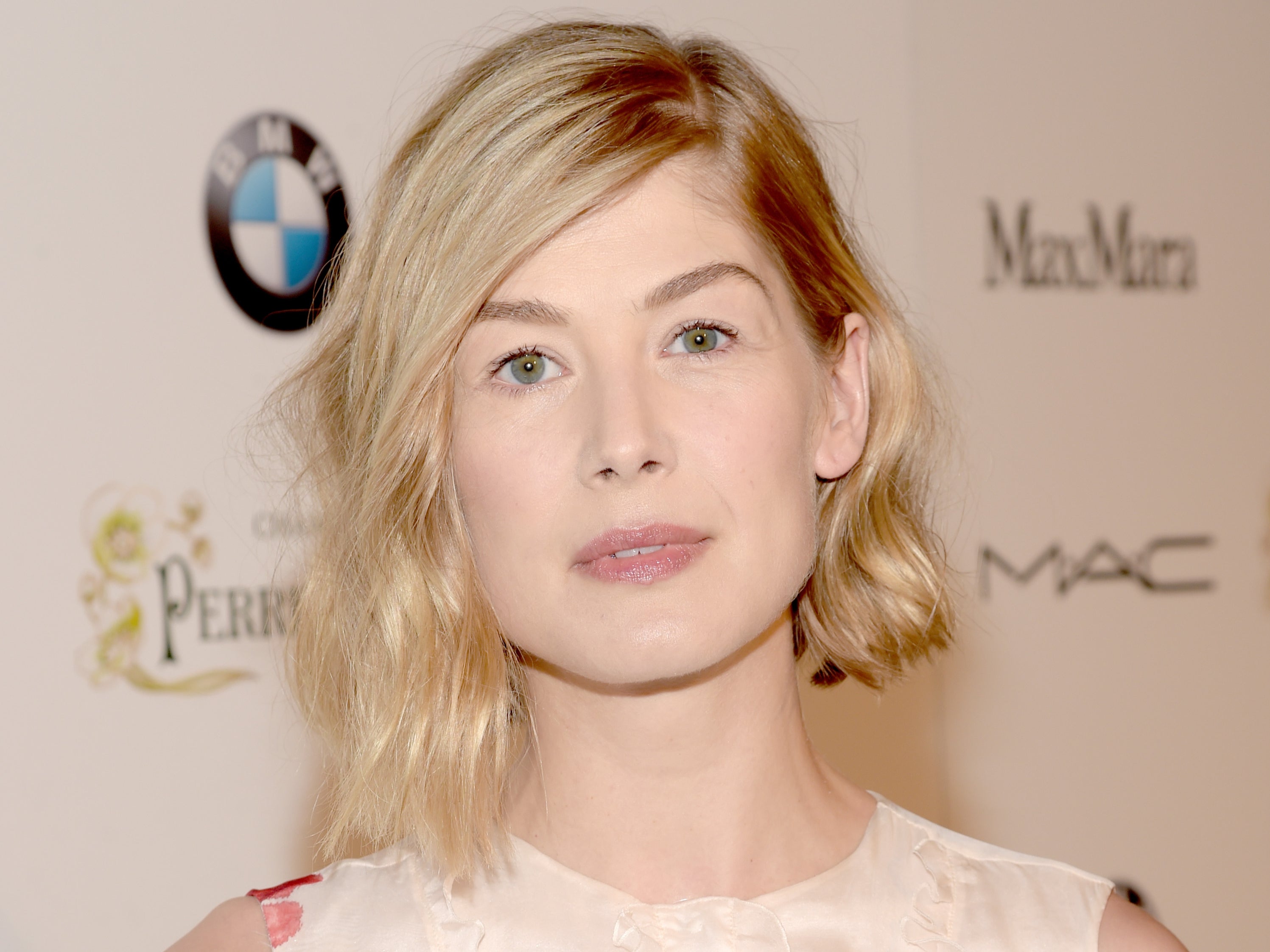 Rosamund Pike was punched in the face when she had her phone snatched