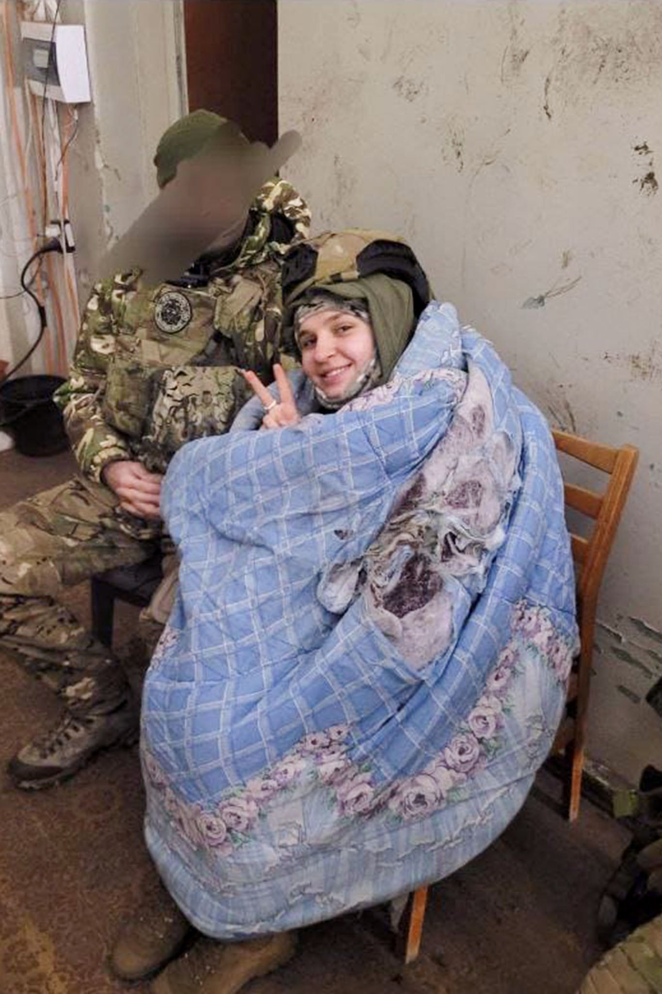 Katya receives care shortly after being injured in an explosion while on duty in Chasiv Yar, Ukraine