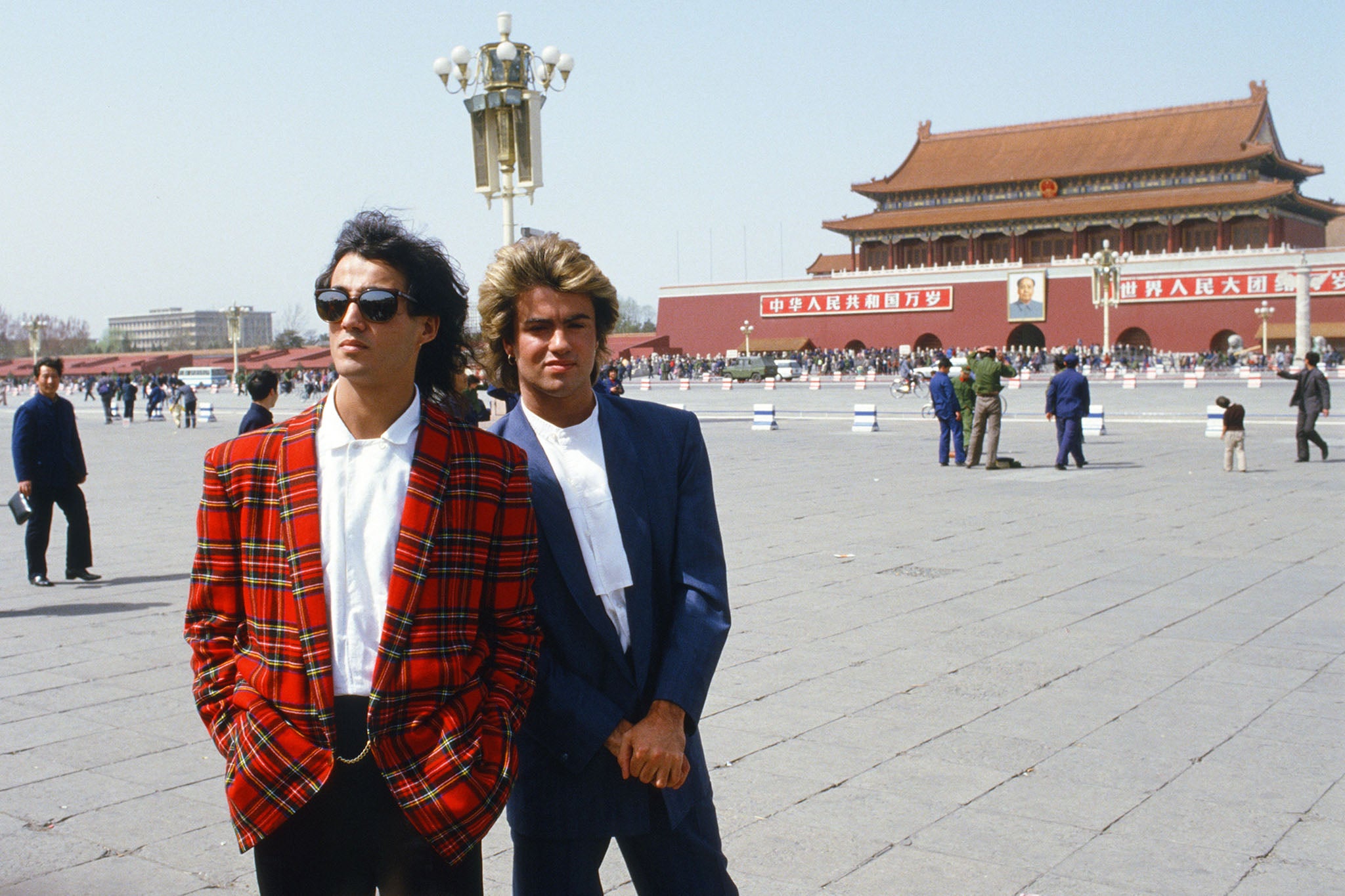 Andrew Ridgeley and George Michael in front of the Forbidden City in Tiananmen Square, Beijing, on Wham!’s 10-day visit to China, April 1985