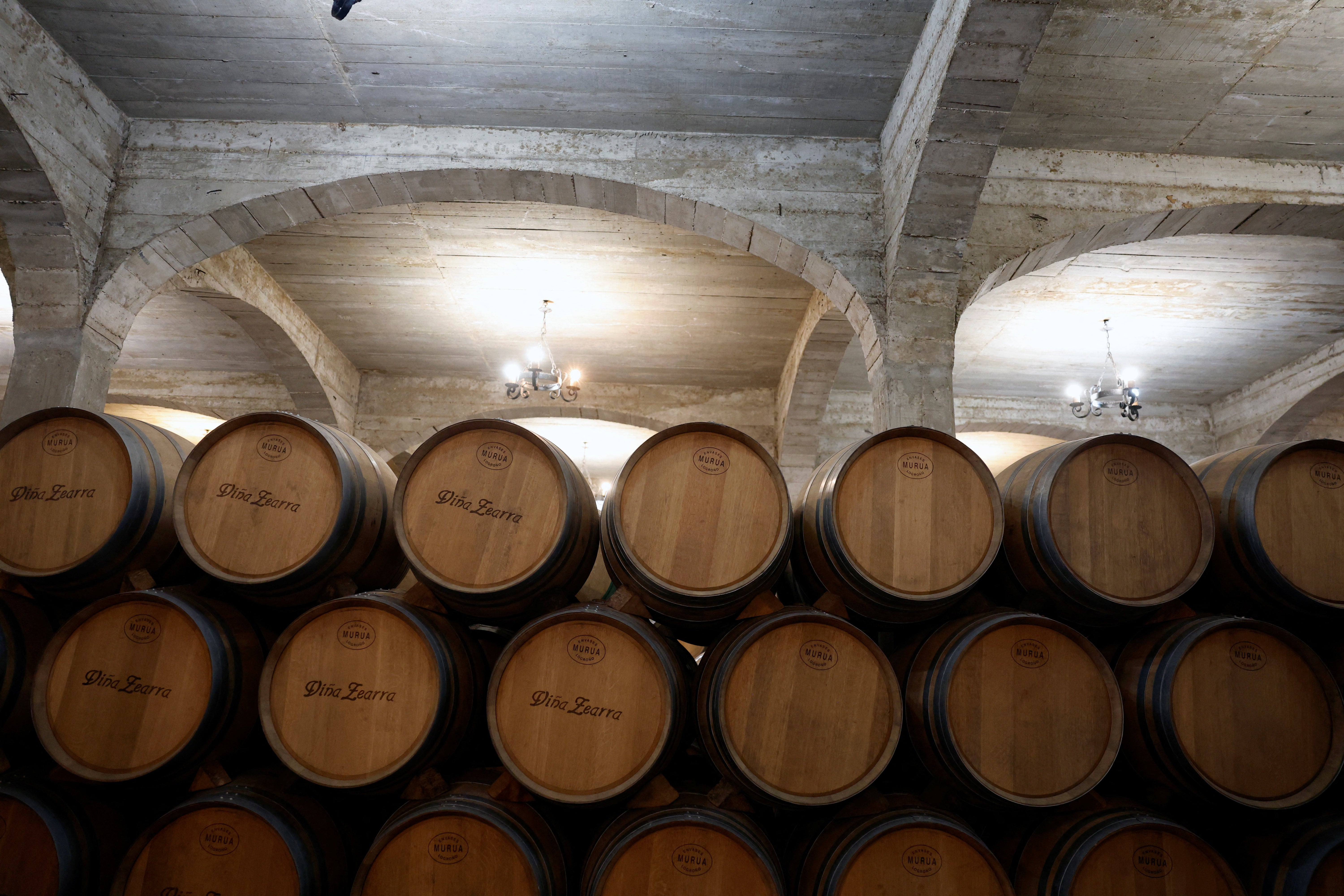 Wine barrels are stacked at the Petrolanda winery, Fuenmayor, Rioja region, Spain