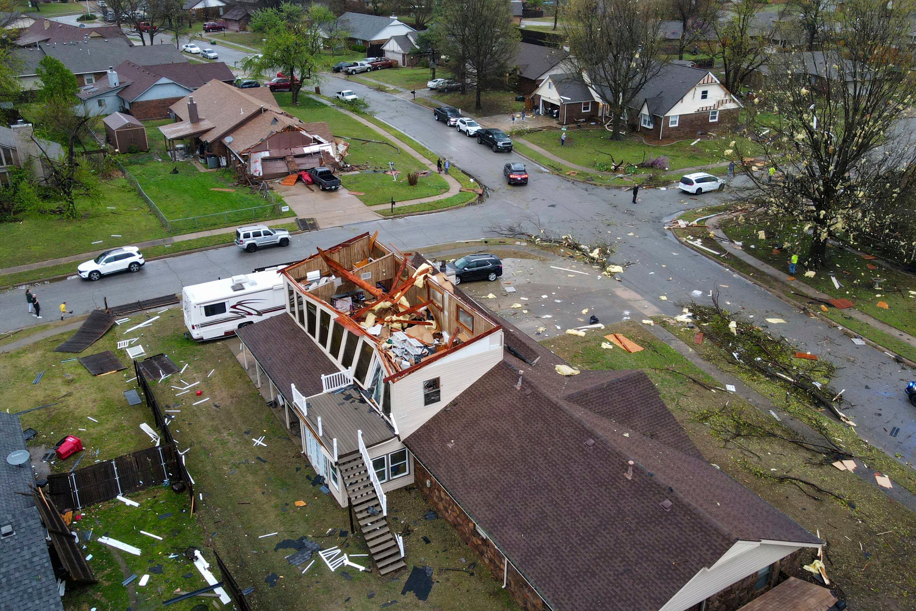 An early morning severe storm damaged homes in Oklahoma. Tornadoes were sweeping through Missouri and Tennessee on Wednesday afternoon ahead of potentially historic flooding