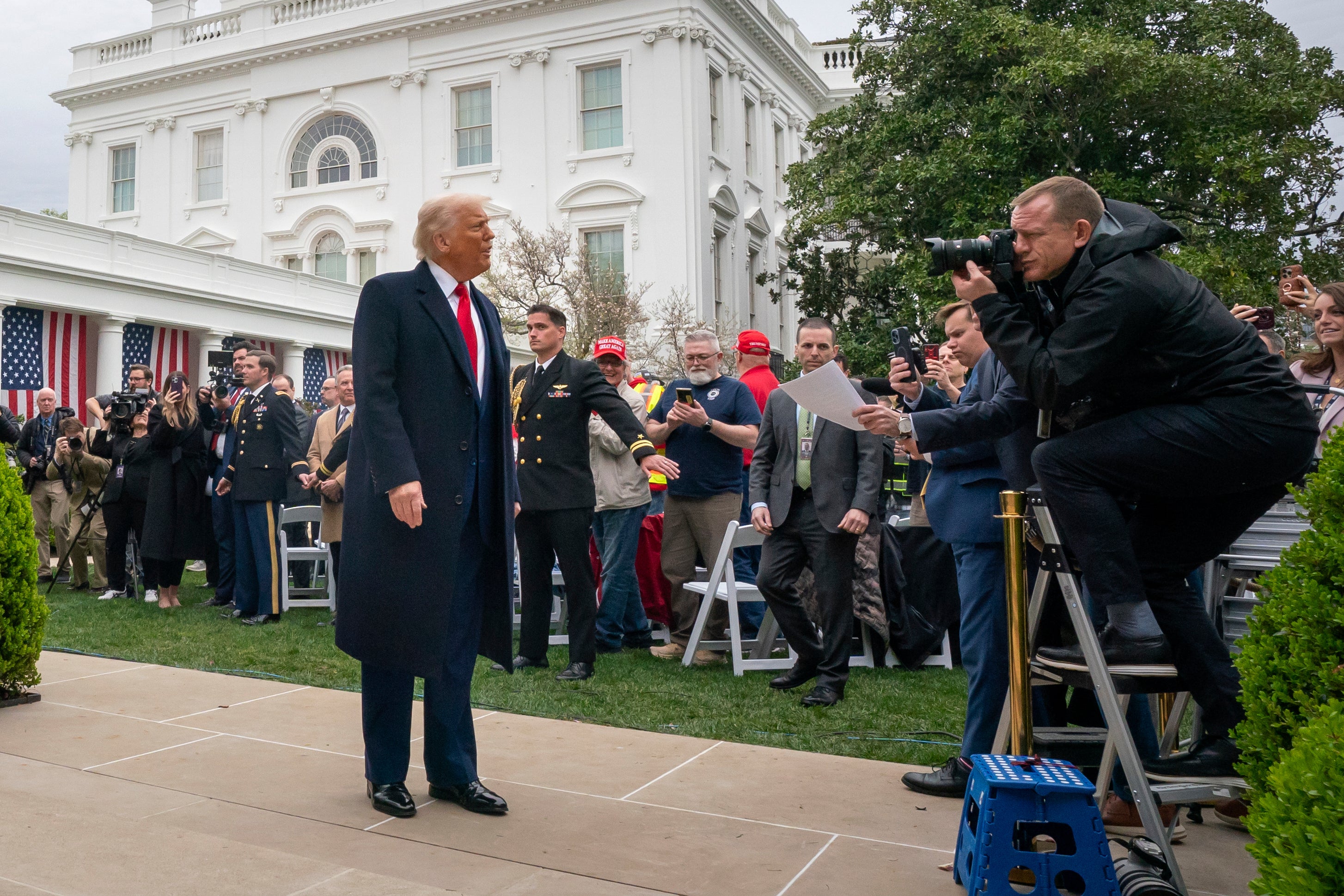 Trump walks back to the Oval Office after signing revealing his new program of tariffs