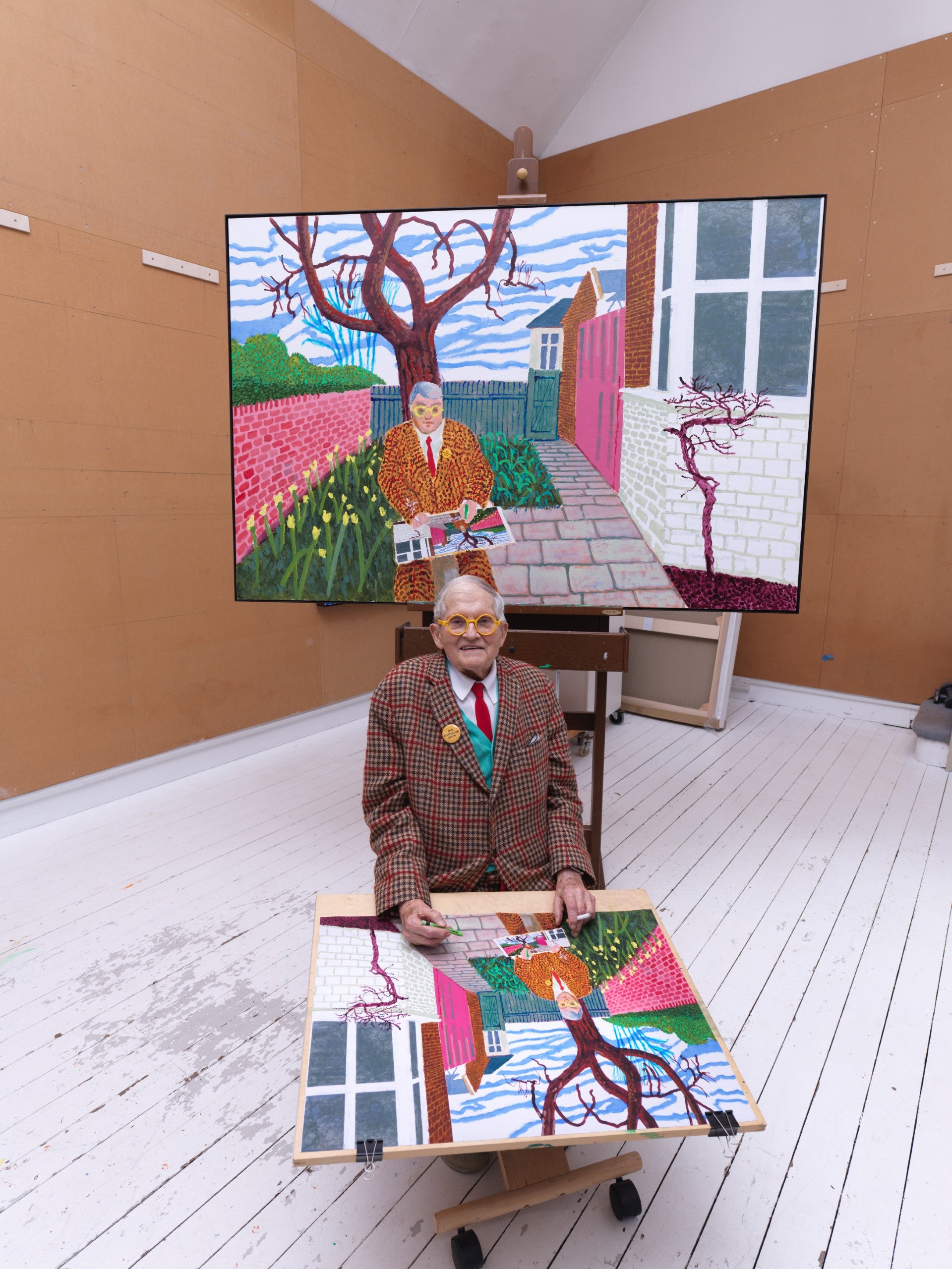 The banned poster: David Hockney sits with his artwork Play within a Play within a Play and Me with a Cigarette