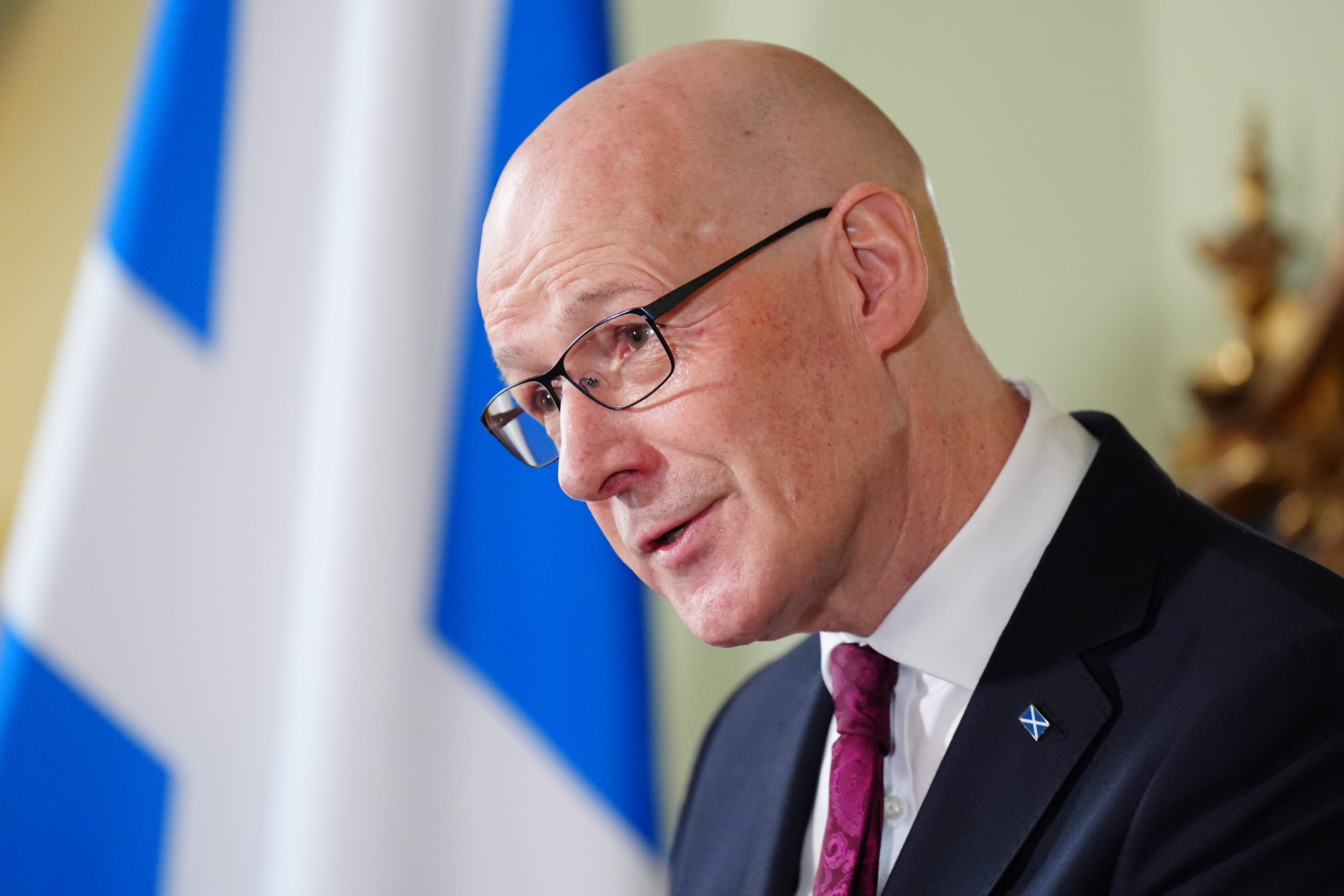 Tariffs imposed by US President Donald Trump are ‘not good news’ John Swinney said (Jane Barlow/PA)
