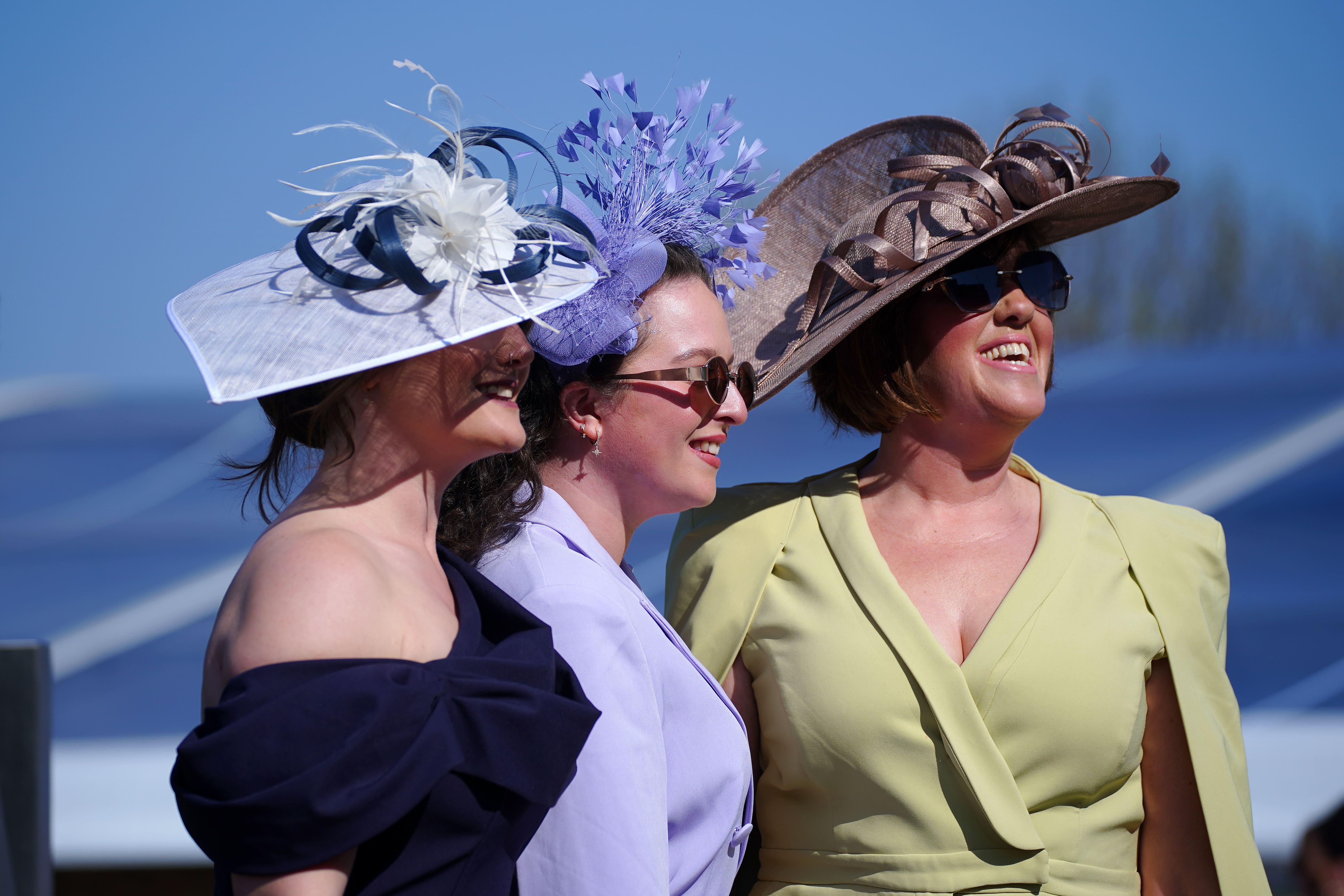 Crowds enjoyed the sunshine for the opening day at Aintree Racecourse (Peter Byrne/PA)