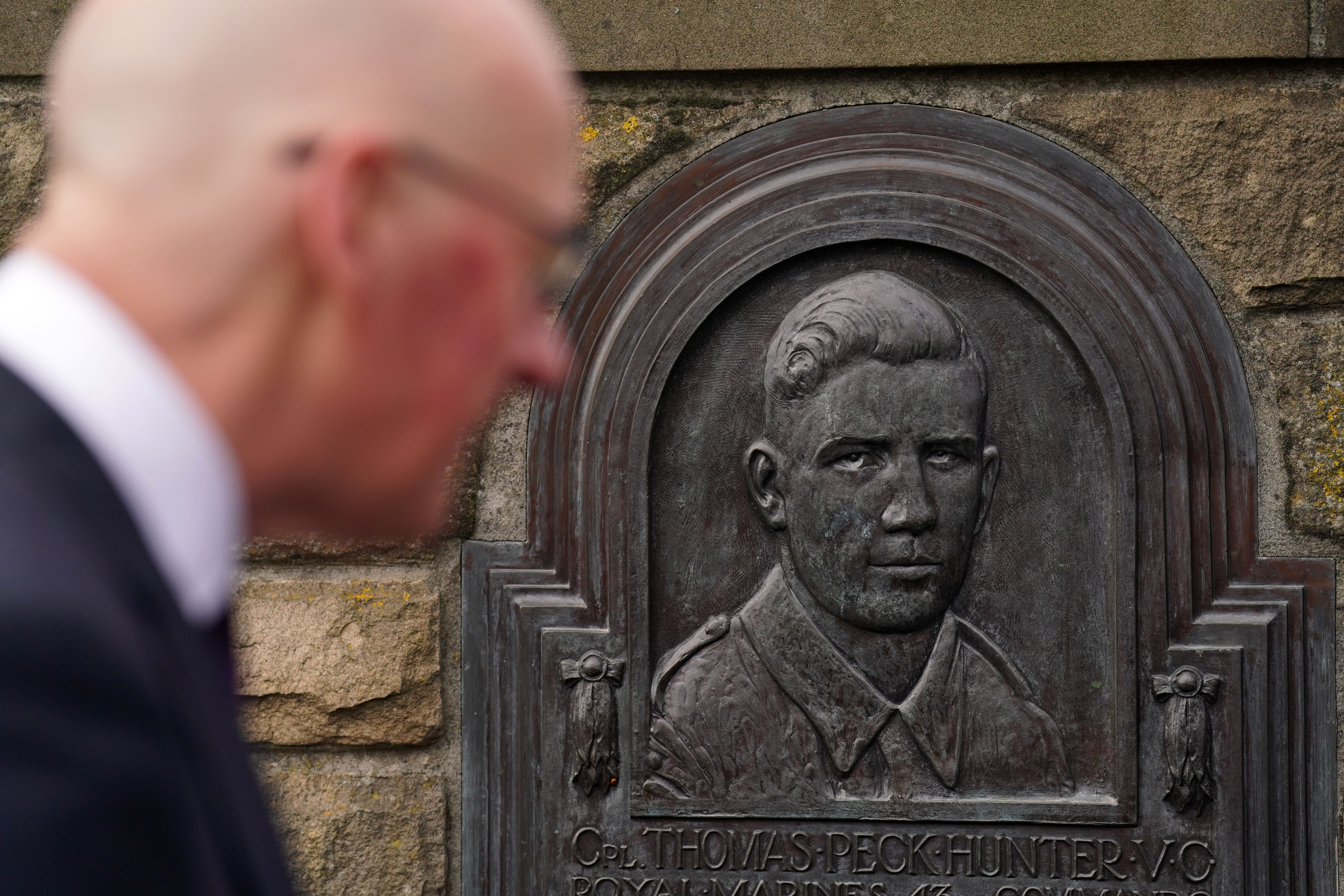 John Swinney looks at the portrait of his uncle Thomas Peck Hunter who won a VC (Andrew Milligan/PA)