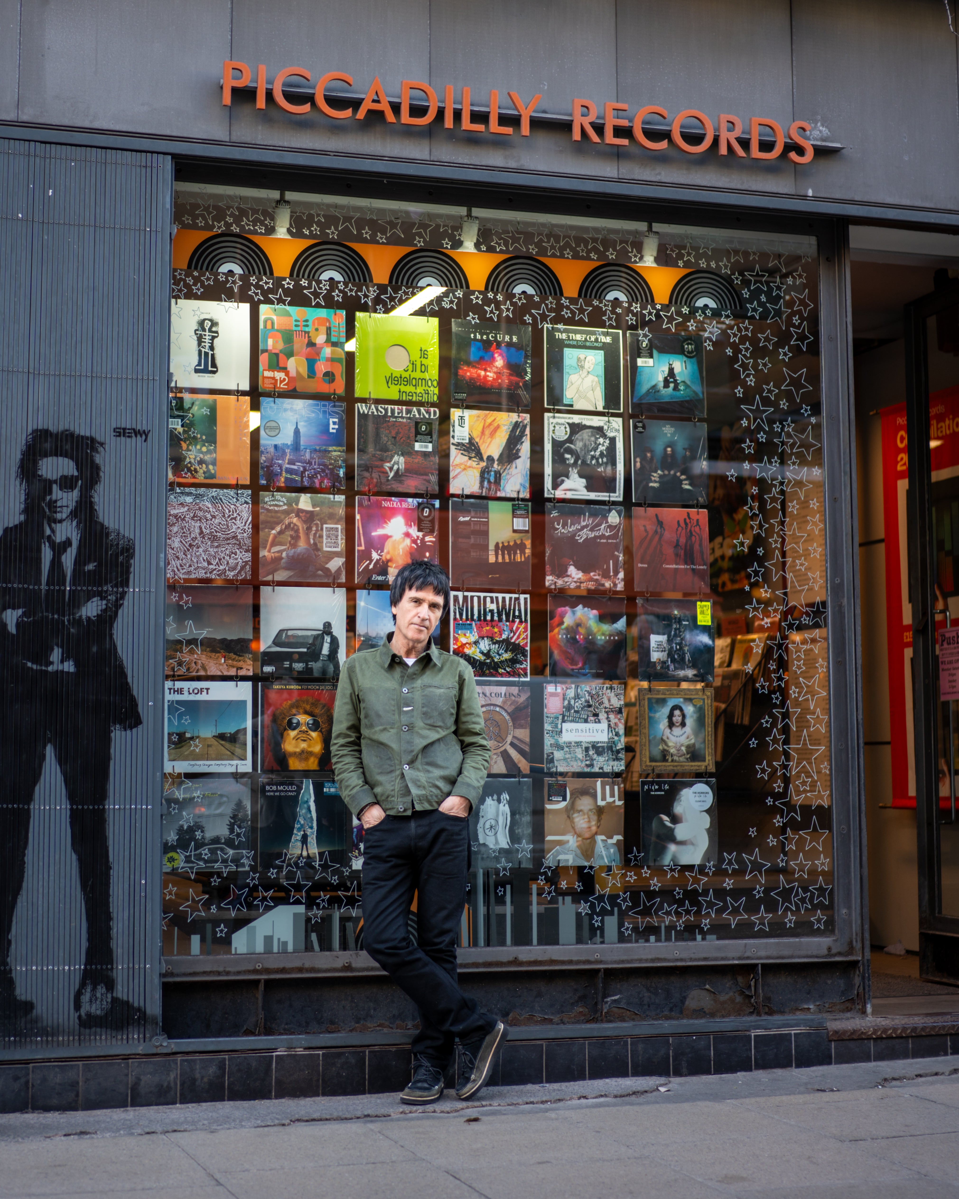Johnny Marr outside Piccadilly Records in Manchester