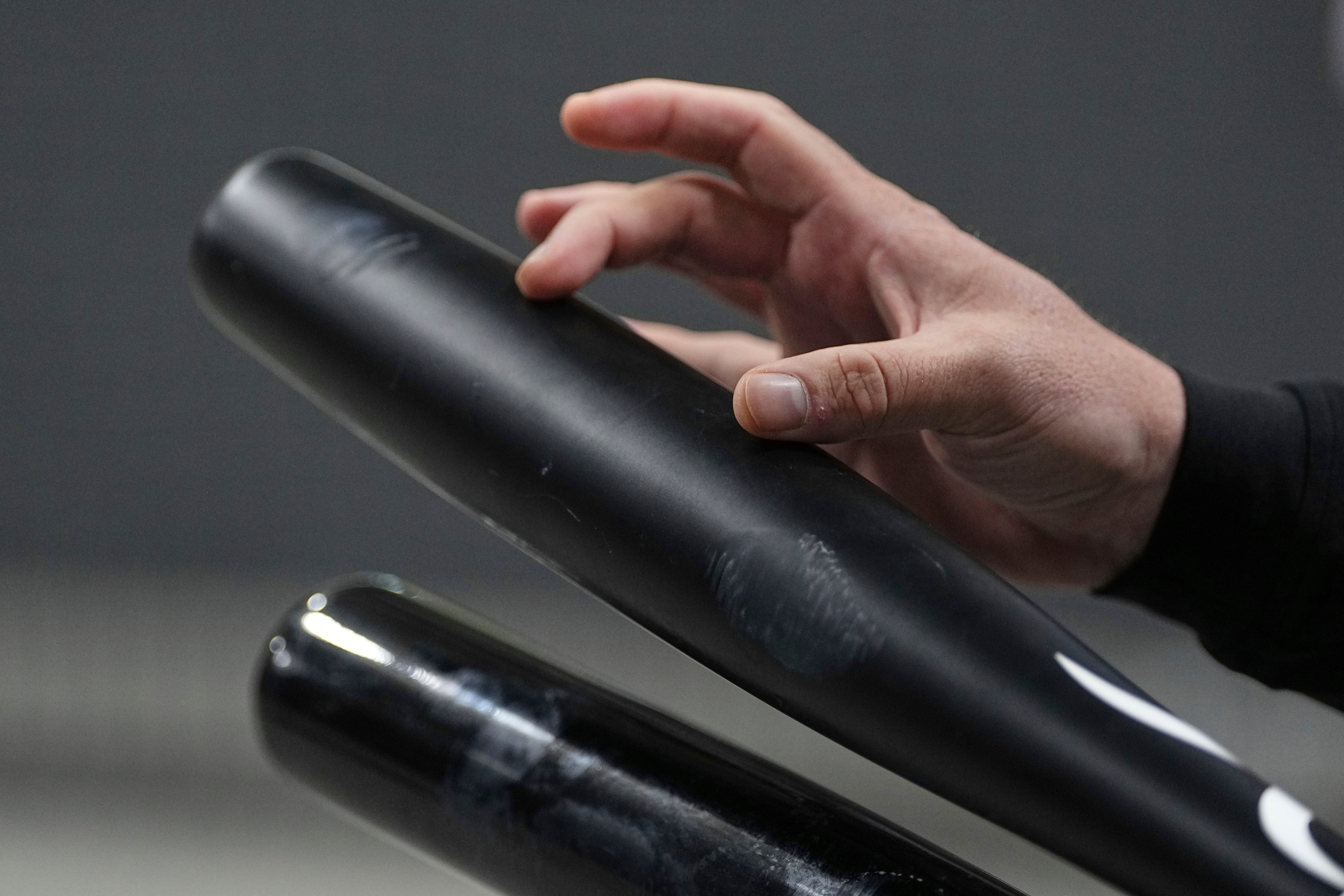 Jared Smith speaks about torpedo baseball bats during an interview at Victus Sports