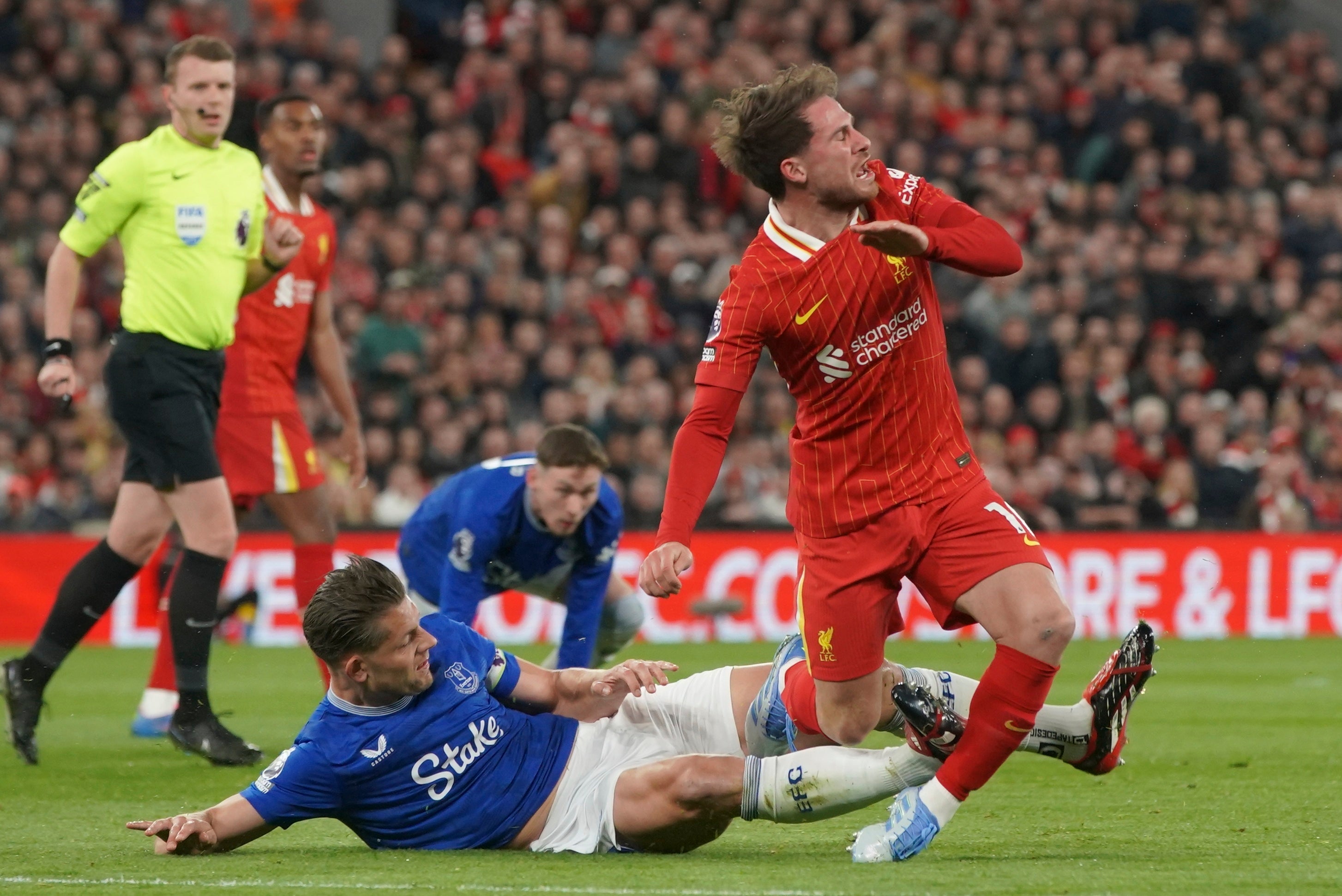 James Tarkowski avoided a red card for a high tackle on Alexis Mac Allister
