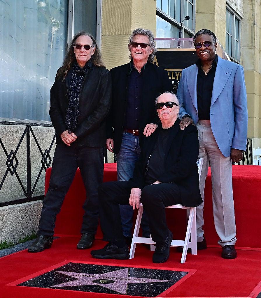 US filmmaker John Carpenter is joined by makeup artist Greg Nicotero and actors Kurt Russell and Keith David at his Walk of Fame Star ceremony