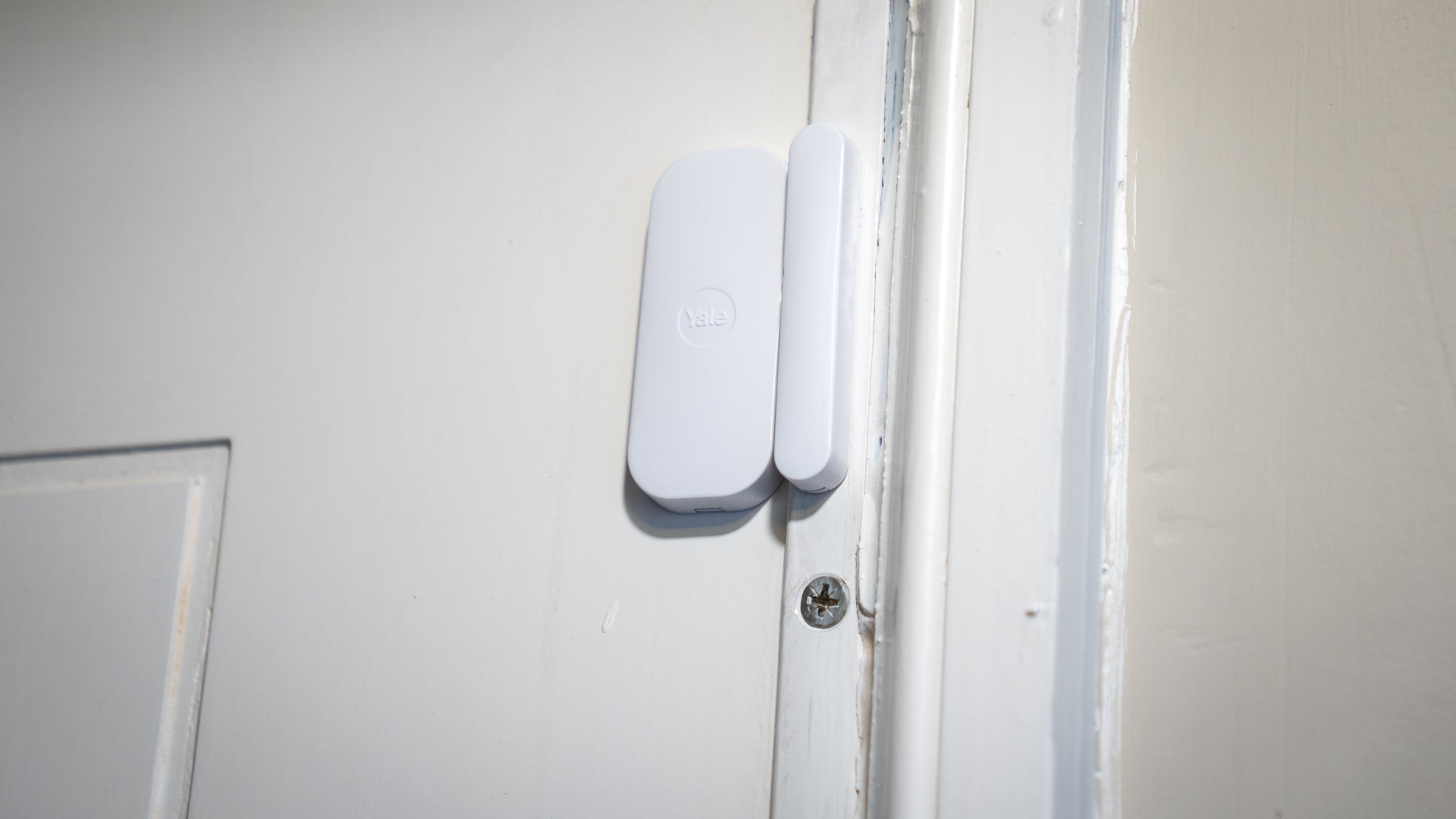 The door/window sensors can be mounted with included screws or adhesive strips