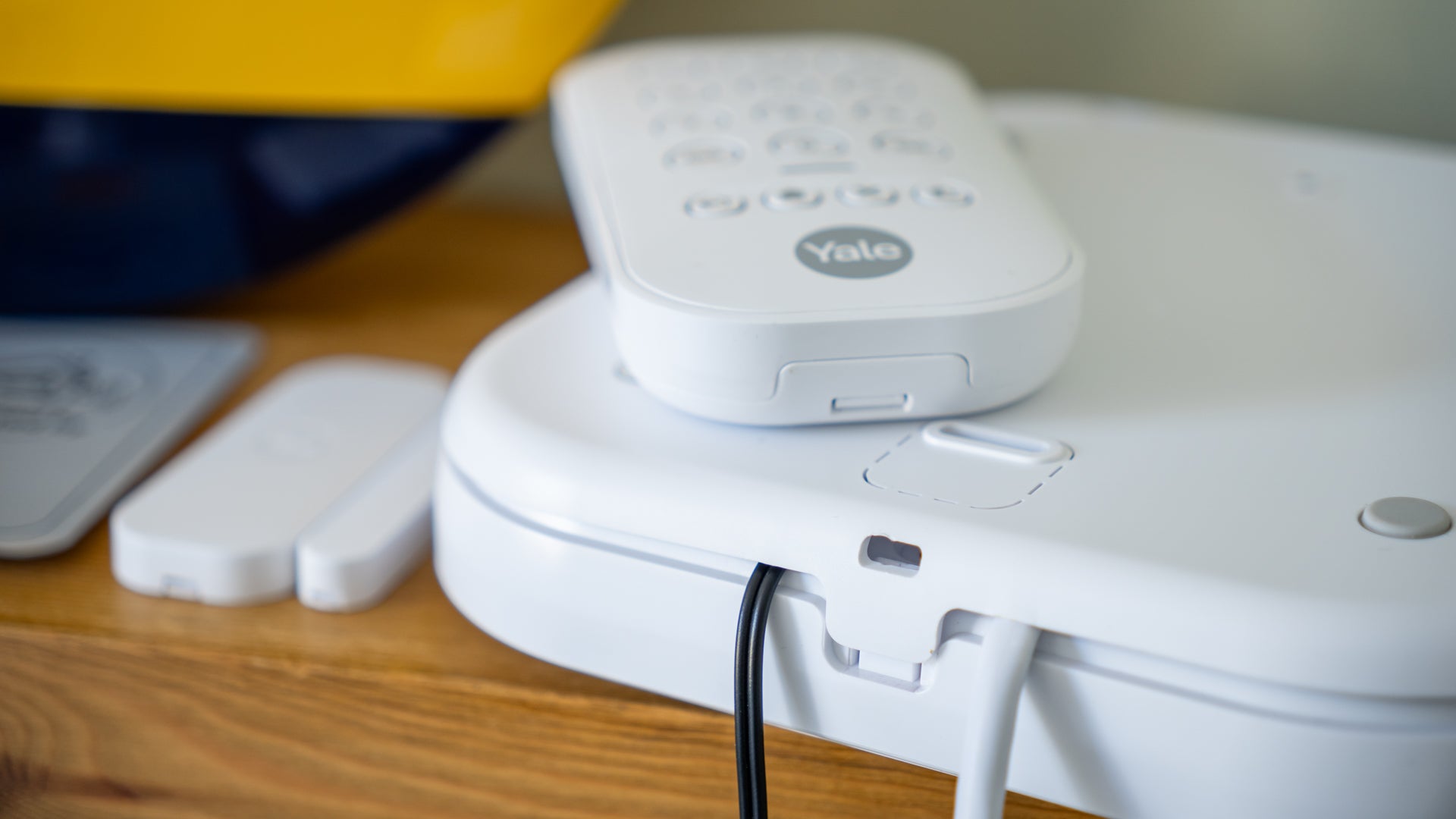 The rear of the hub can’t be closed when the cables are installed as suggested by Yale