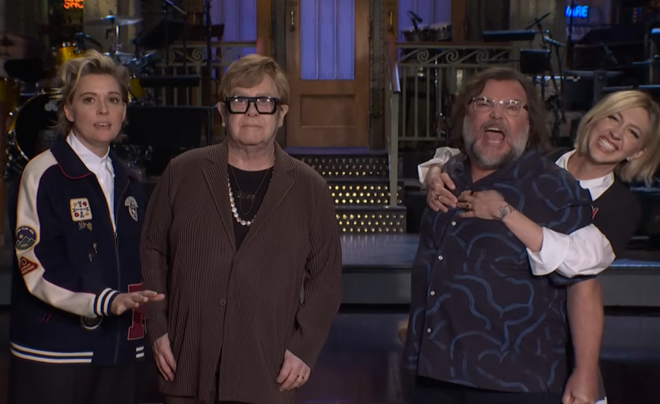 Jack Black has to be restrained in an SNL skit starring Elton John