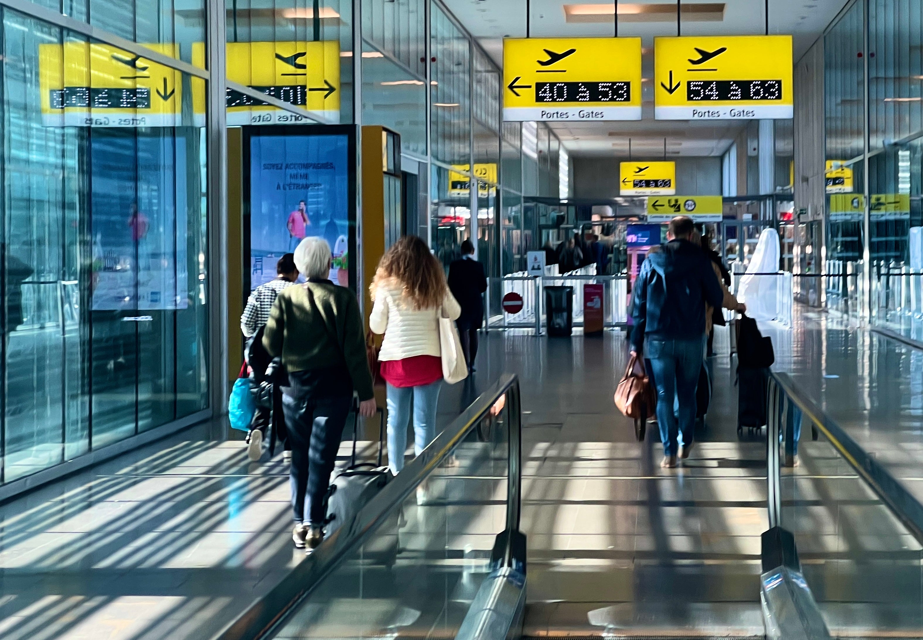 On your marks: passengers hurrying through Toulouse airport in southwest France