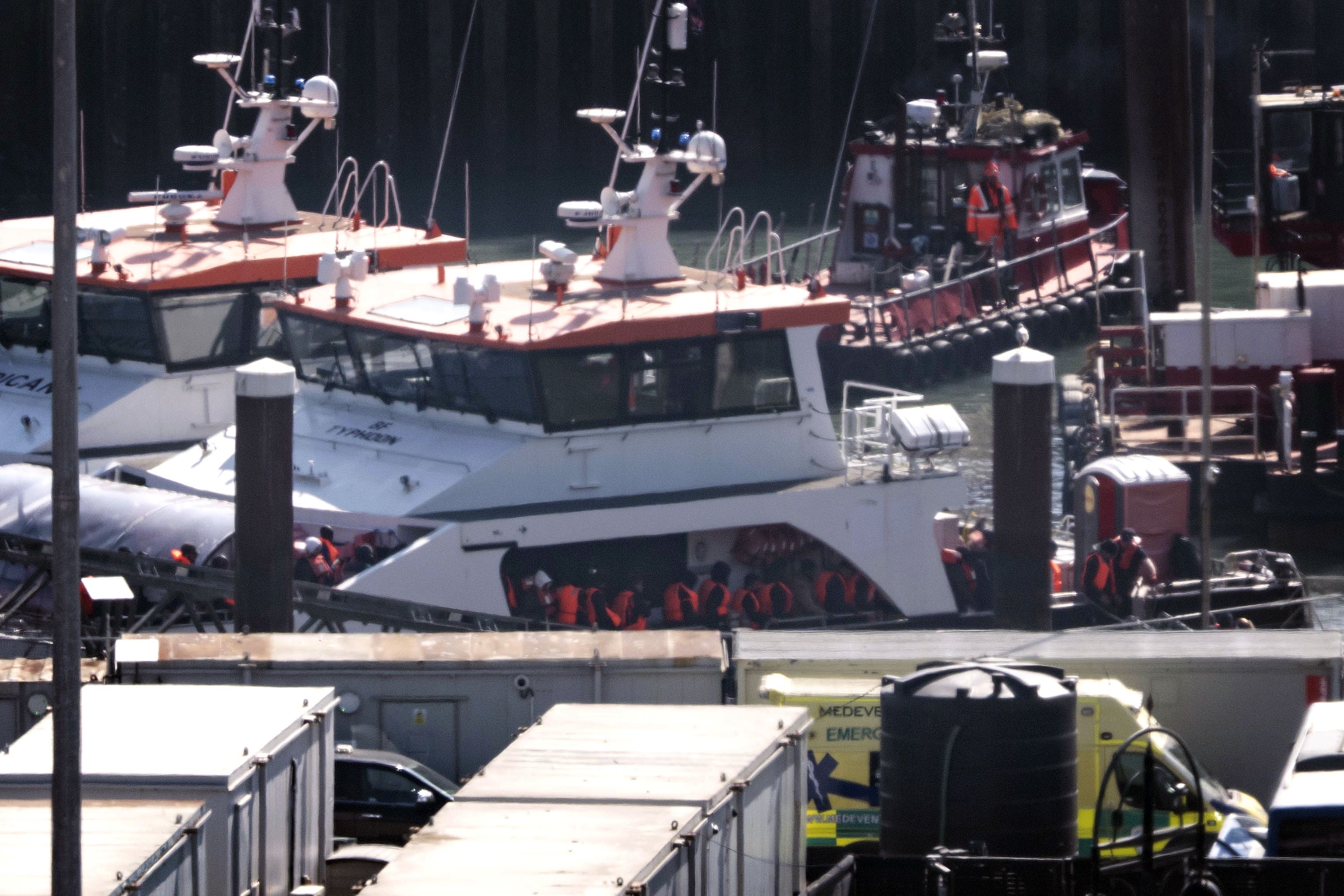 A group of people thought to be migrants are brought in to Dover (Gareth Fuller/PA)