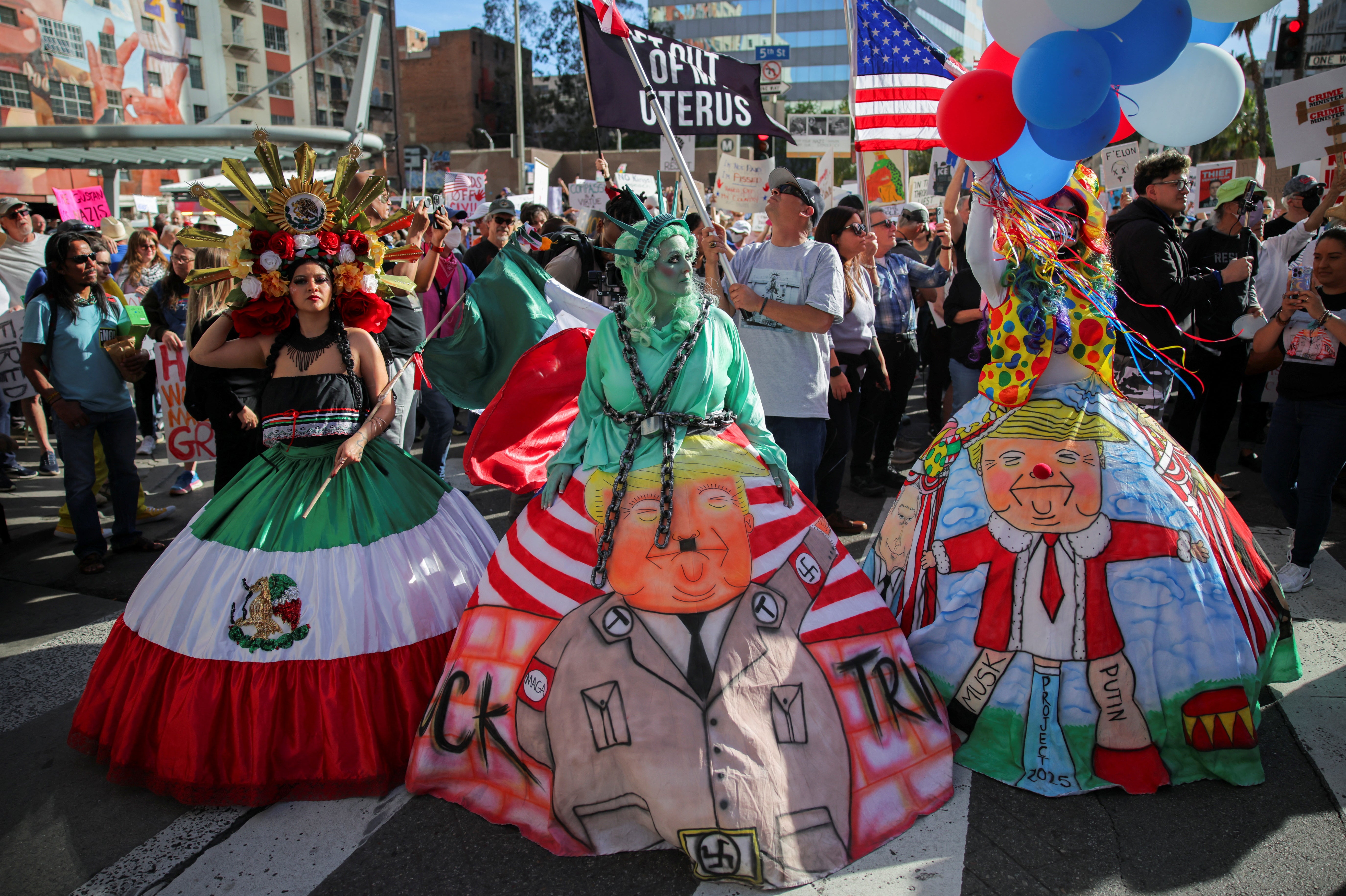 Vividly dressed protesters in Pershing Square, Los Angeles