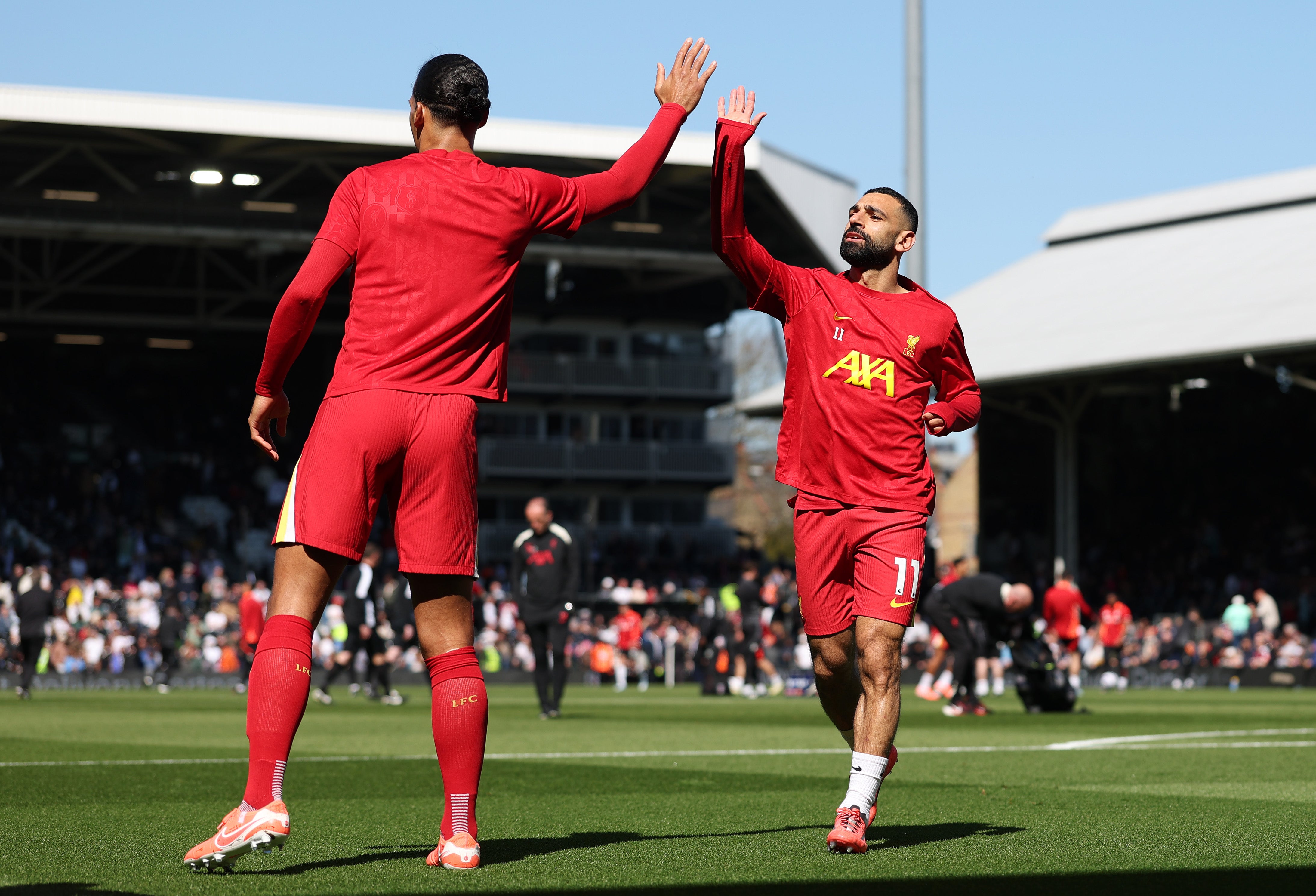 Virgil van Dijk (left) has followed Mohamed Salah in agreeing a new deal