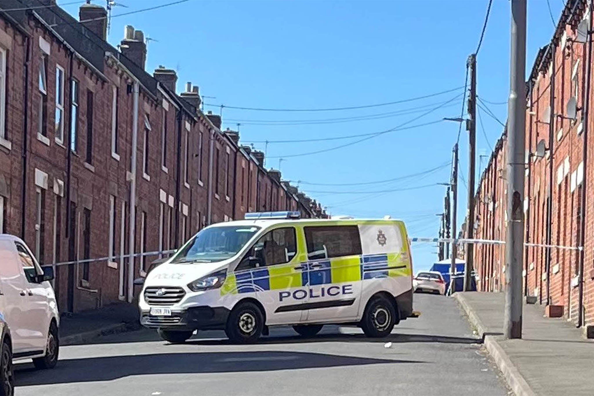 Police at the scene in Elm Street, Stanley, County Durham