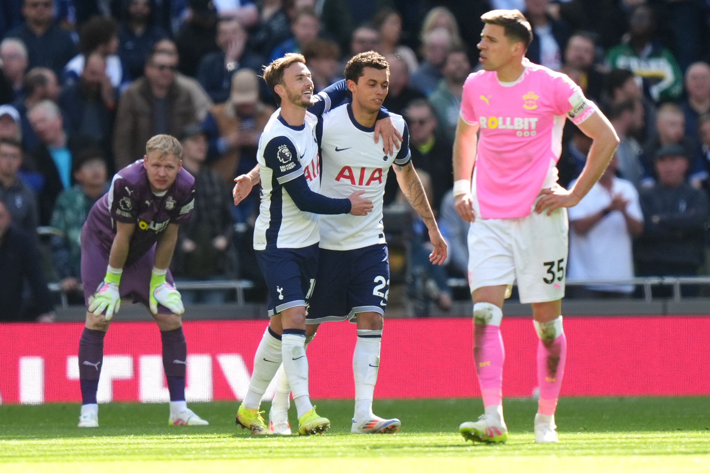 Tottenham players celebrate after scoring