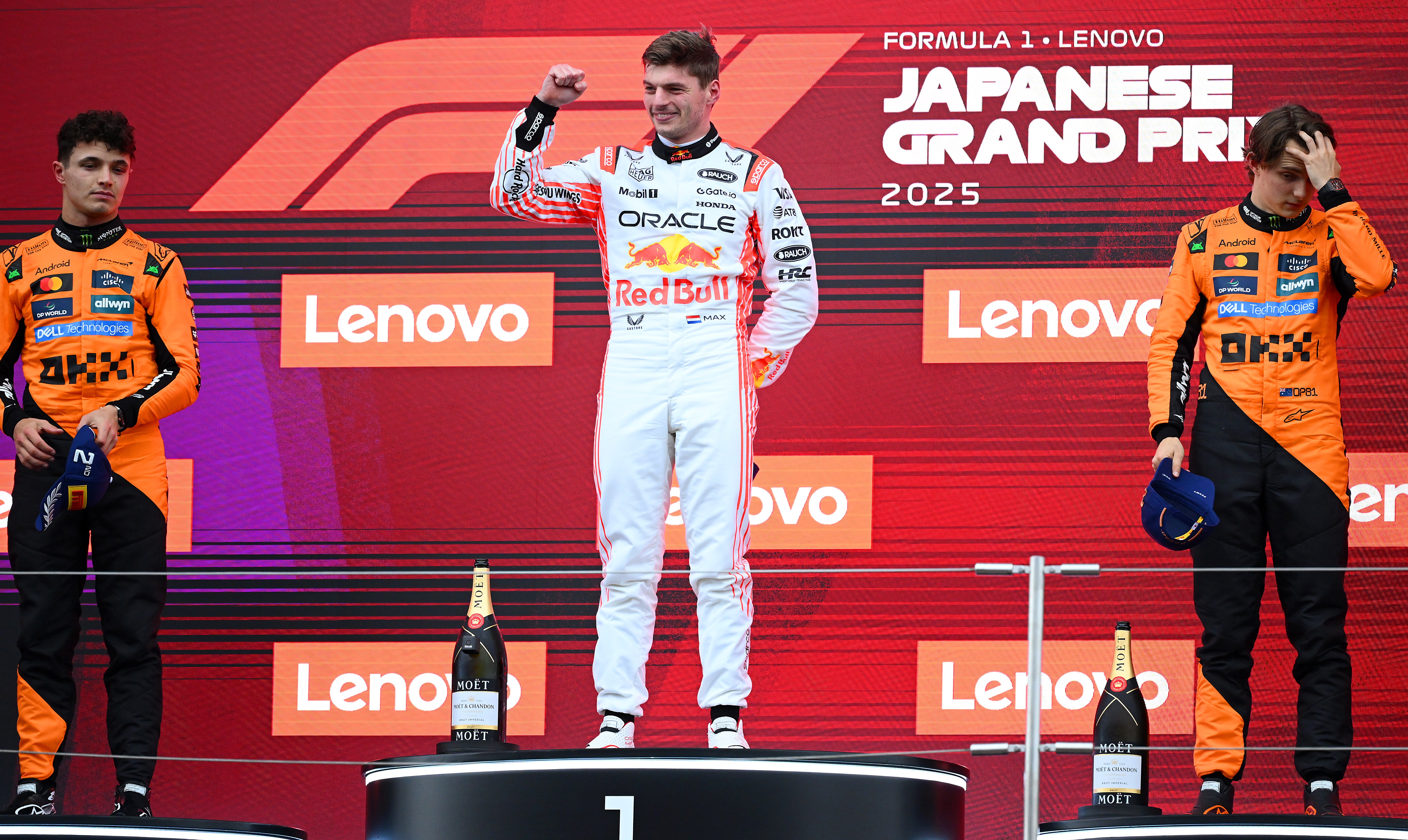 Verstappen held off a late challenge from both McLaren drivers