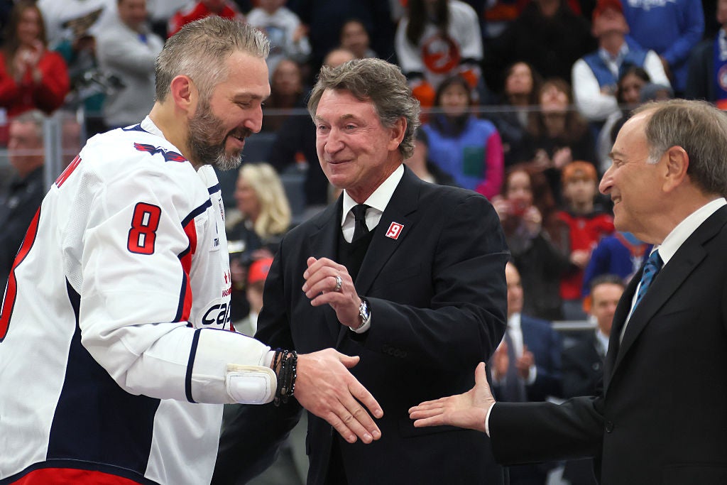 Ovechkin celebrates with Wayne Gretzky and NHL Commissioner Gary Bettman