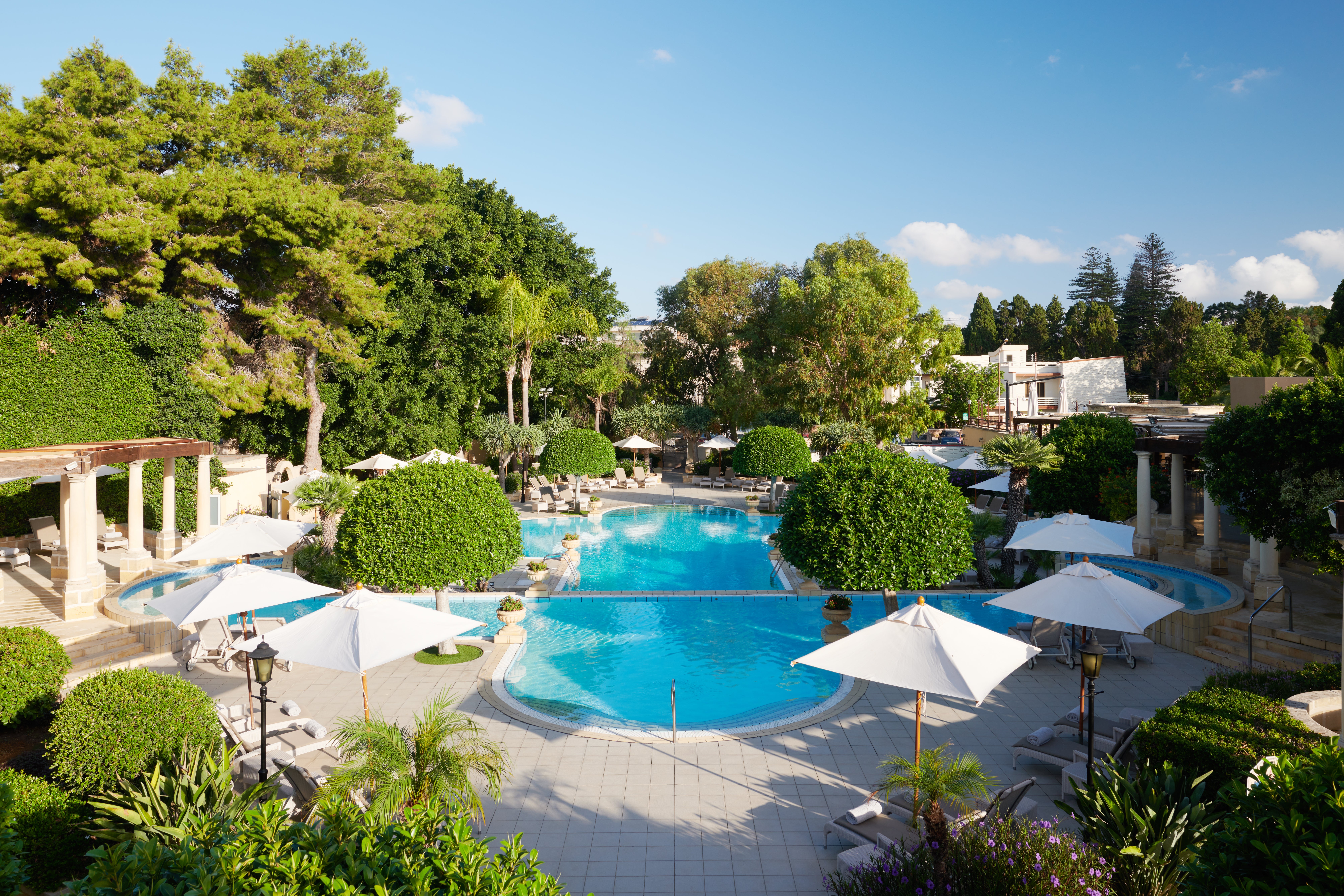 Soak up the sun whilst swimming laps at Corinthia Palace’s multi-level outdoor pool