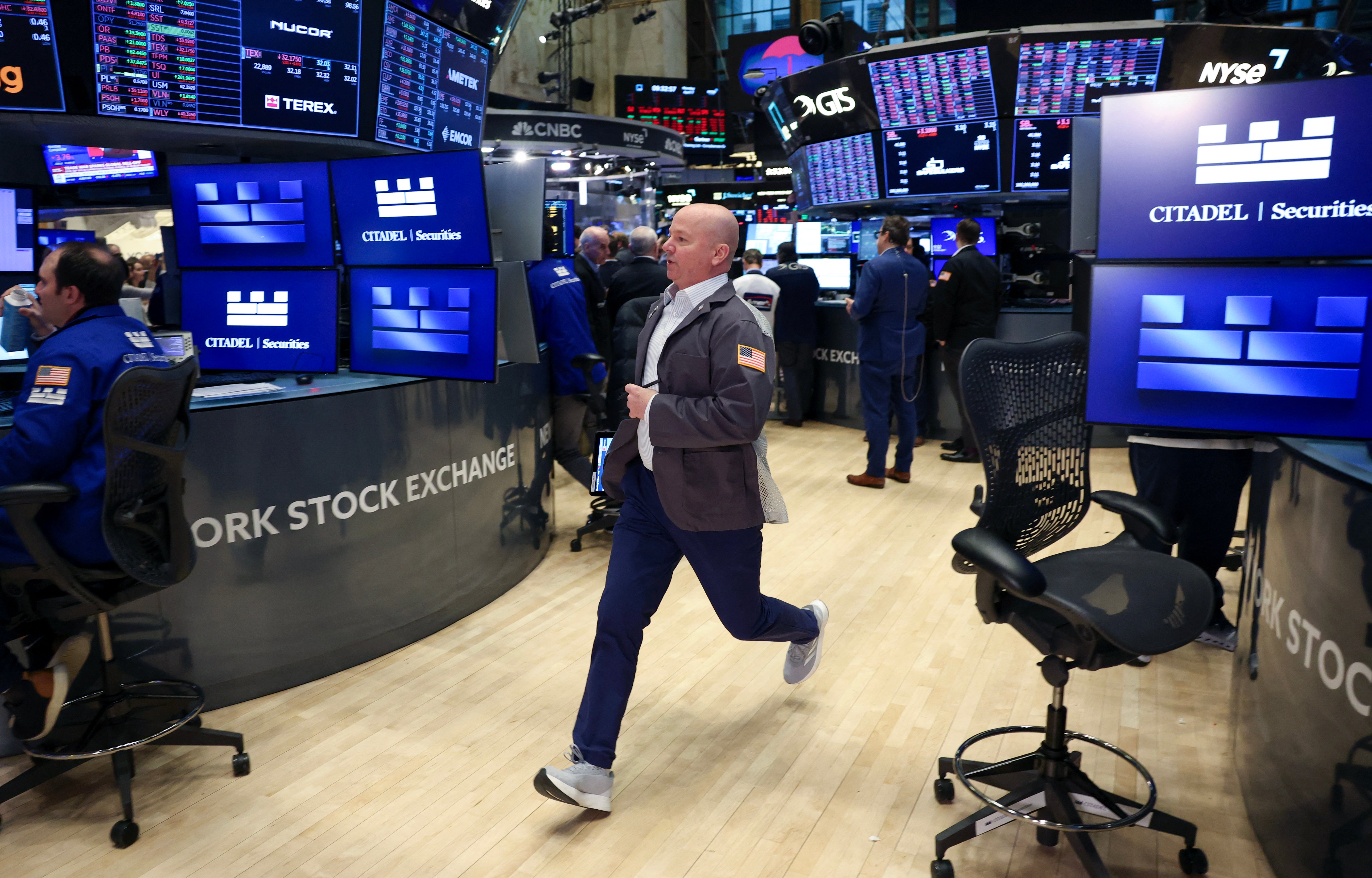 Traders works on the floor of the New York Stock Exchange