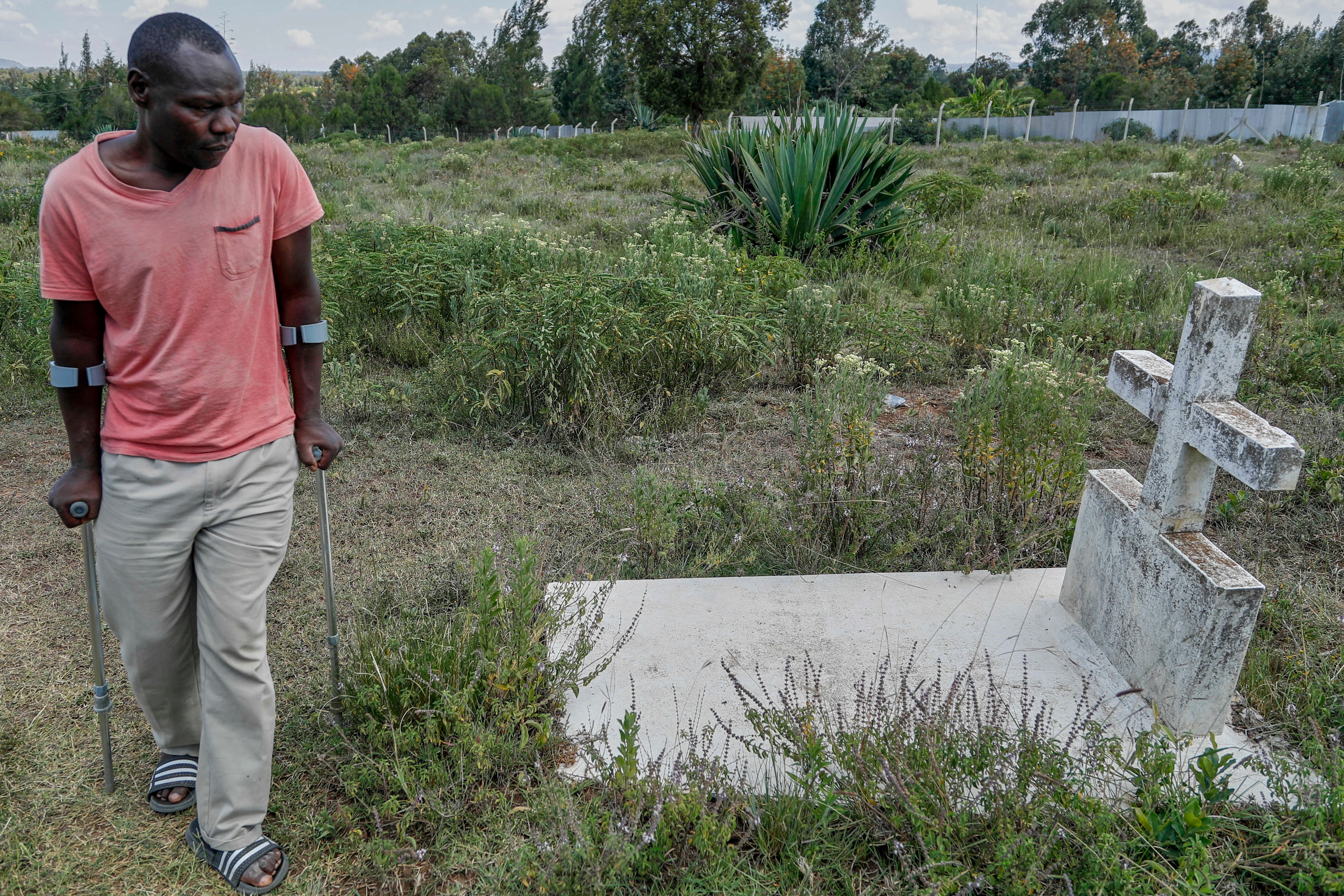 Agnes Wanjiru’s brother-in-law John Muchiri Kamunge visits her grave in Nanyuki