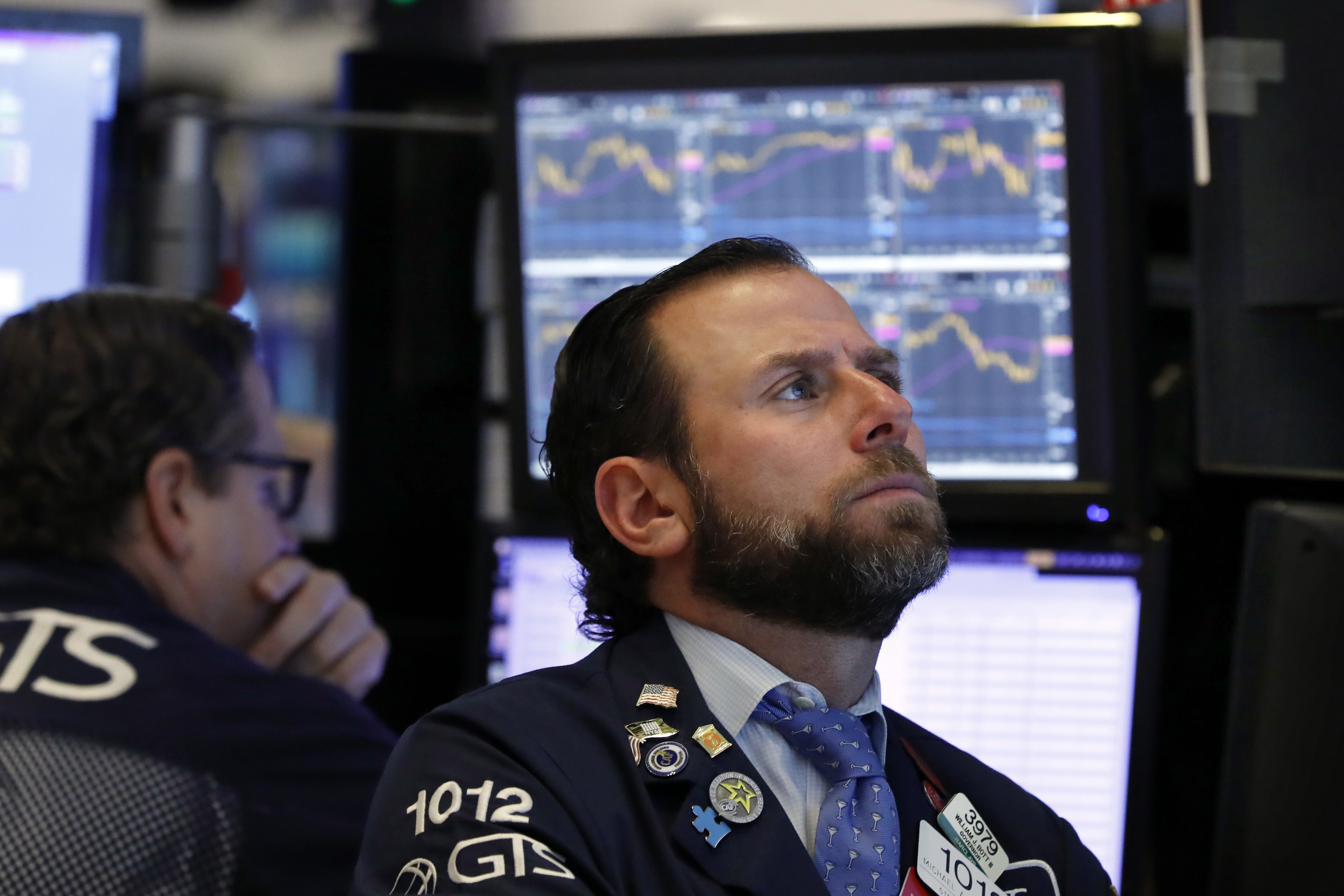 Wall Street stocks have lurched back and forth in a roller-coaster session for global financial markets (Richard Drew/AP)