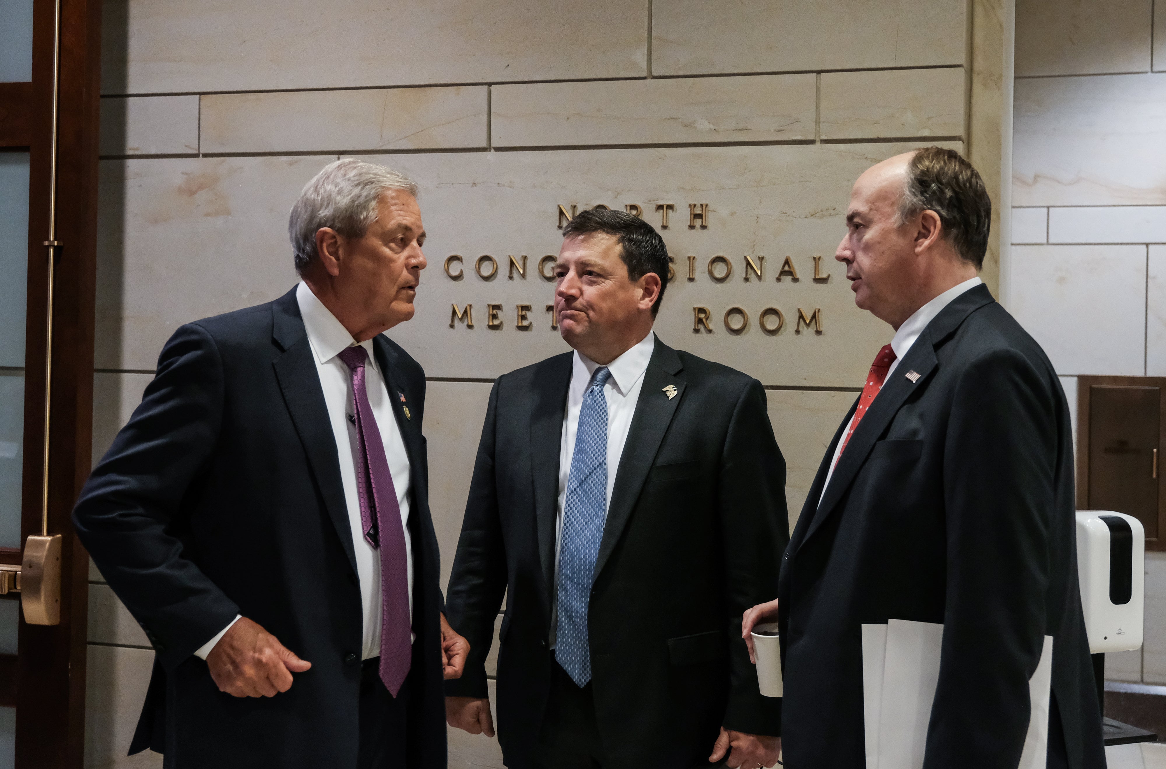 Ed Martin (center) speaks with Rep. Ralph Norman and Jeffrey Clark prior to a January 6th field hearing held on June 13, 2023 in Washington, DC