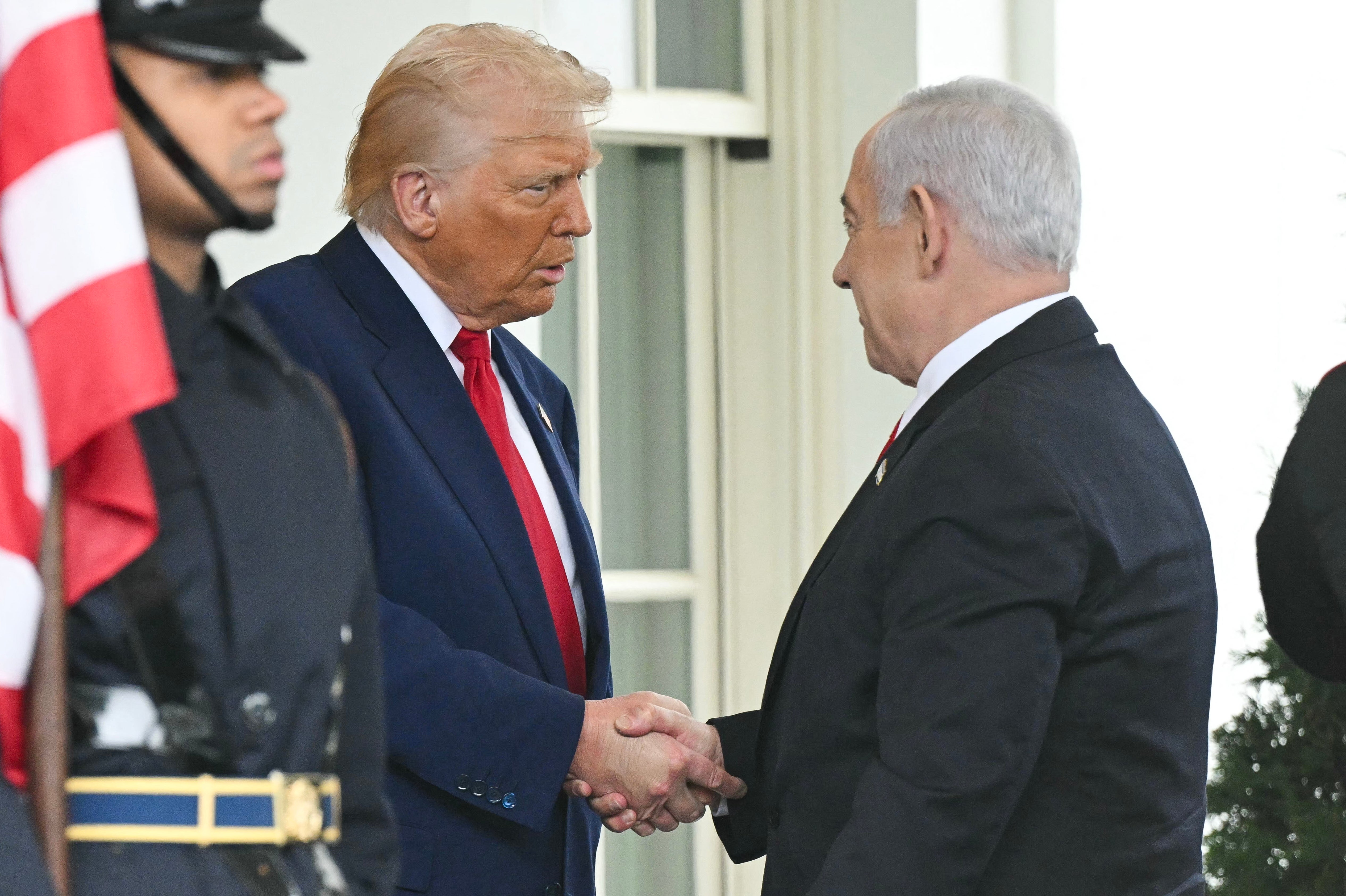 Donald Trump shakes hands with Israeli Prime Minister Benjamin Netanyahu during a White House visit on Monday.