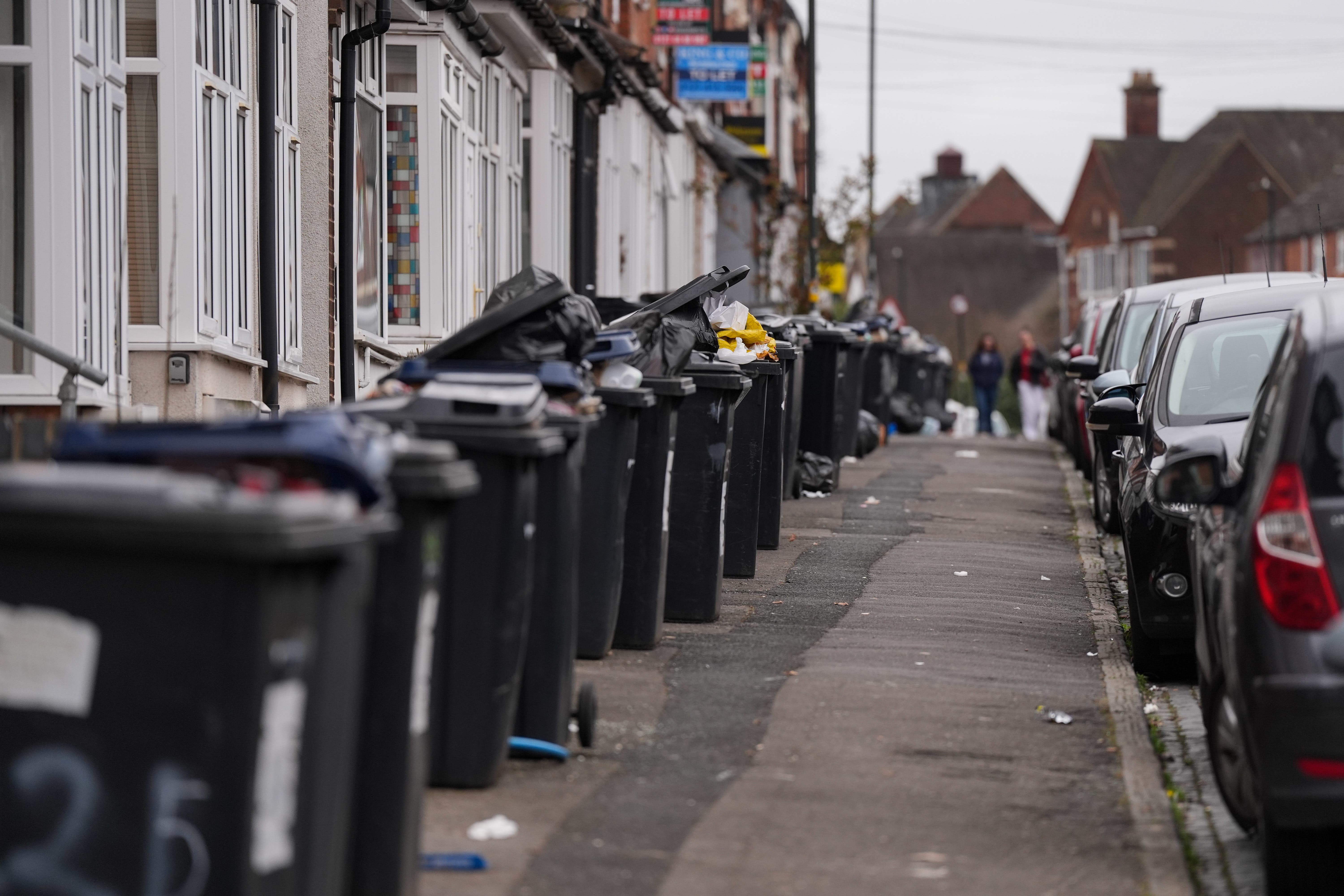 Overflowing bins in Selly Oak, Birmingham during the bin workers’ strike (Jacob King/PA)