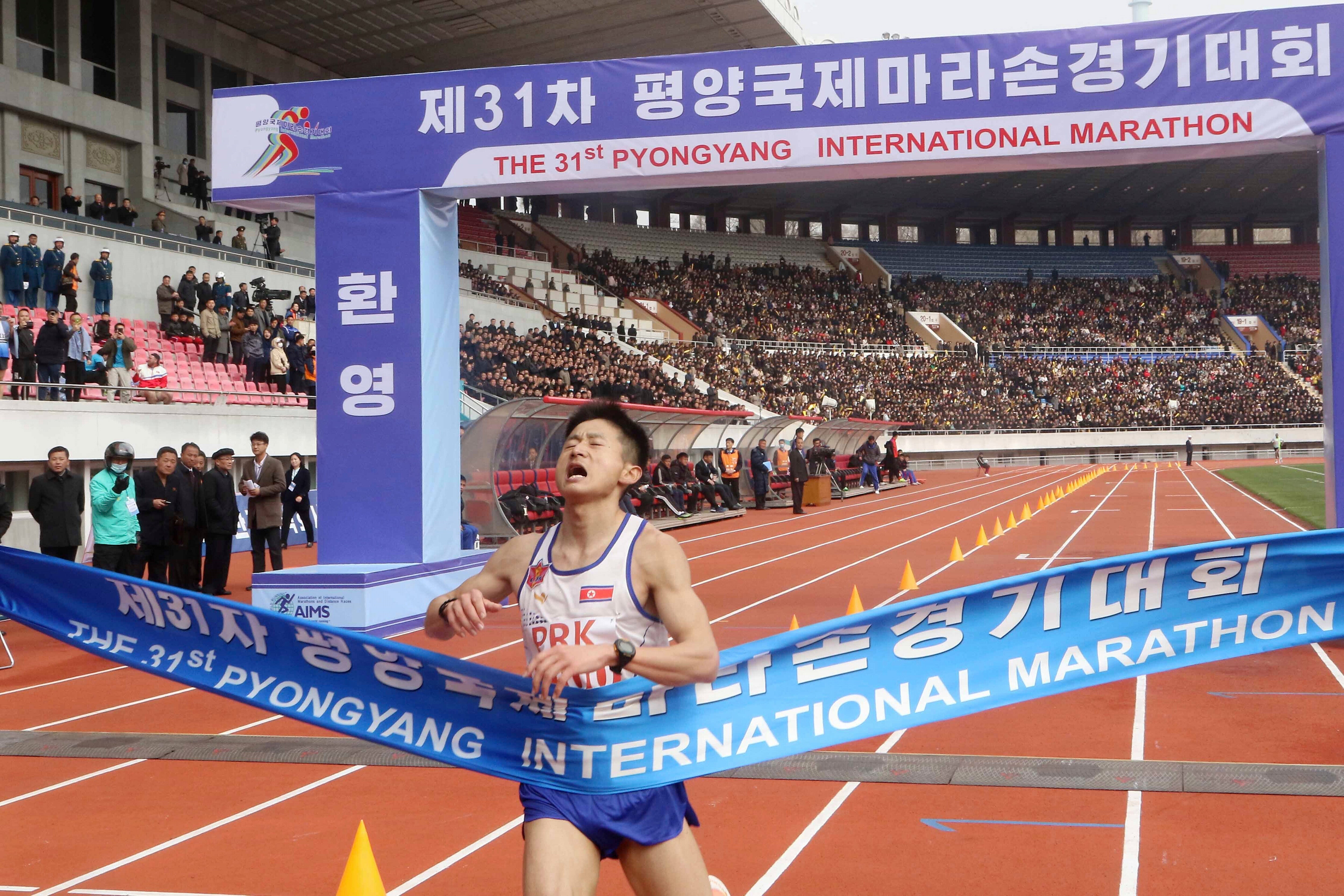 North Korean runner Pak Kum Dong wins the international marathon in Pyongyang