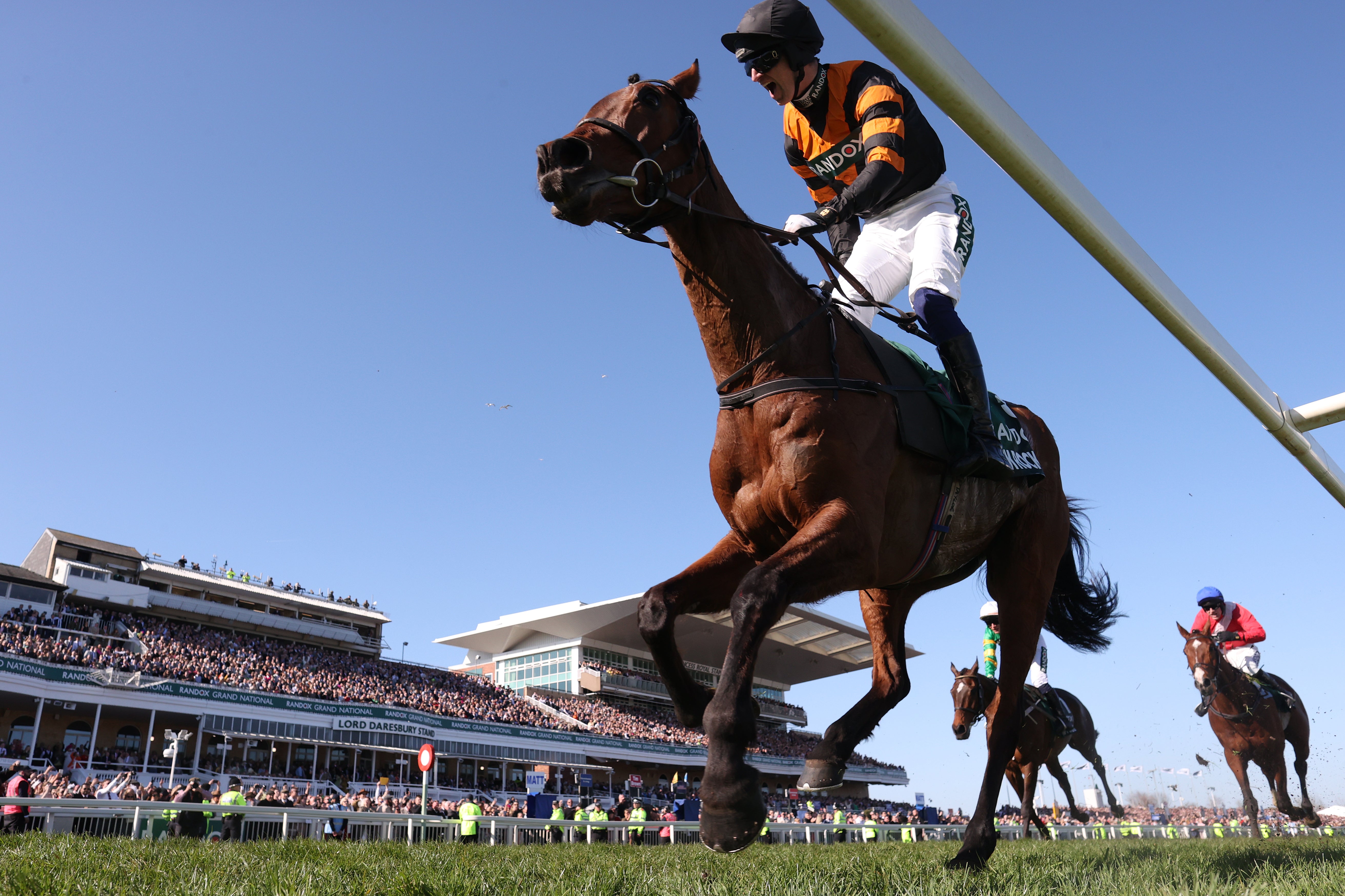 Patrick Mullins celebrates his Grand National victory atop Nick Rockett
