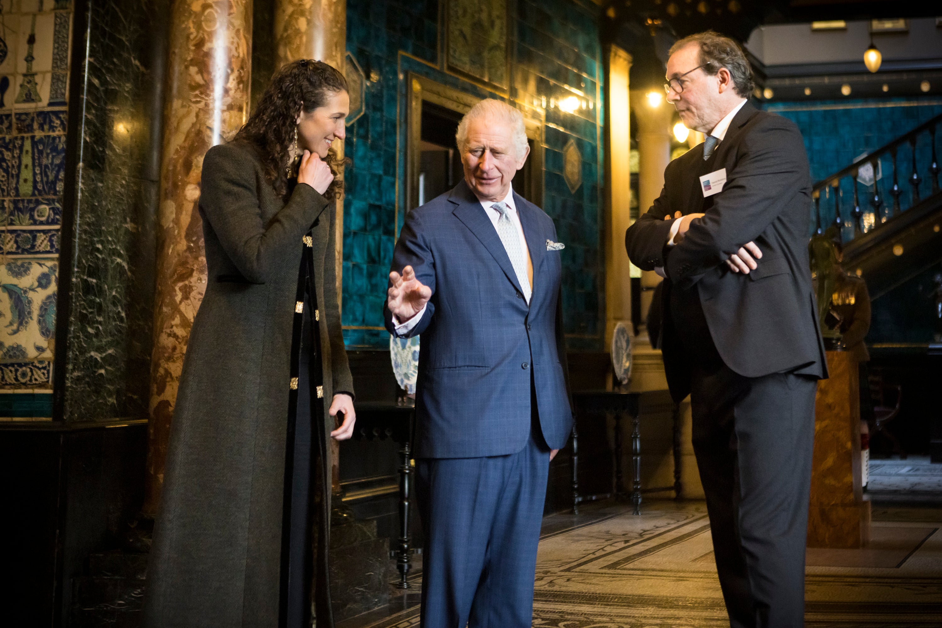 King Charles is shown a carpet commissioned by Turquoise Mountain on display at Leighton House, London, in 2023