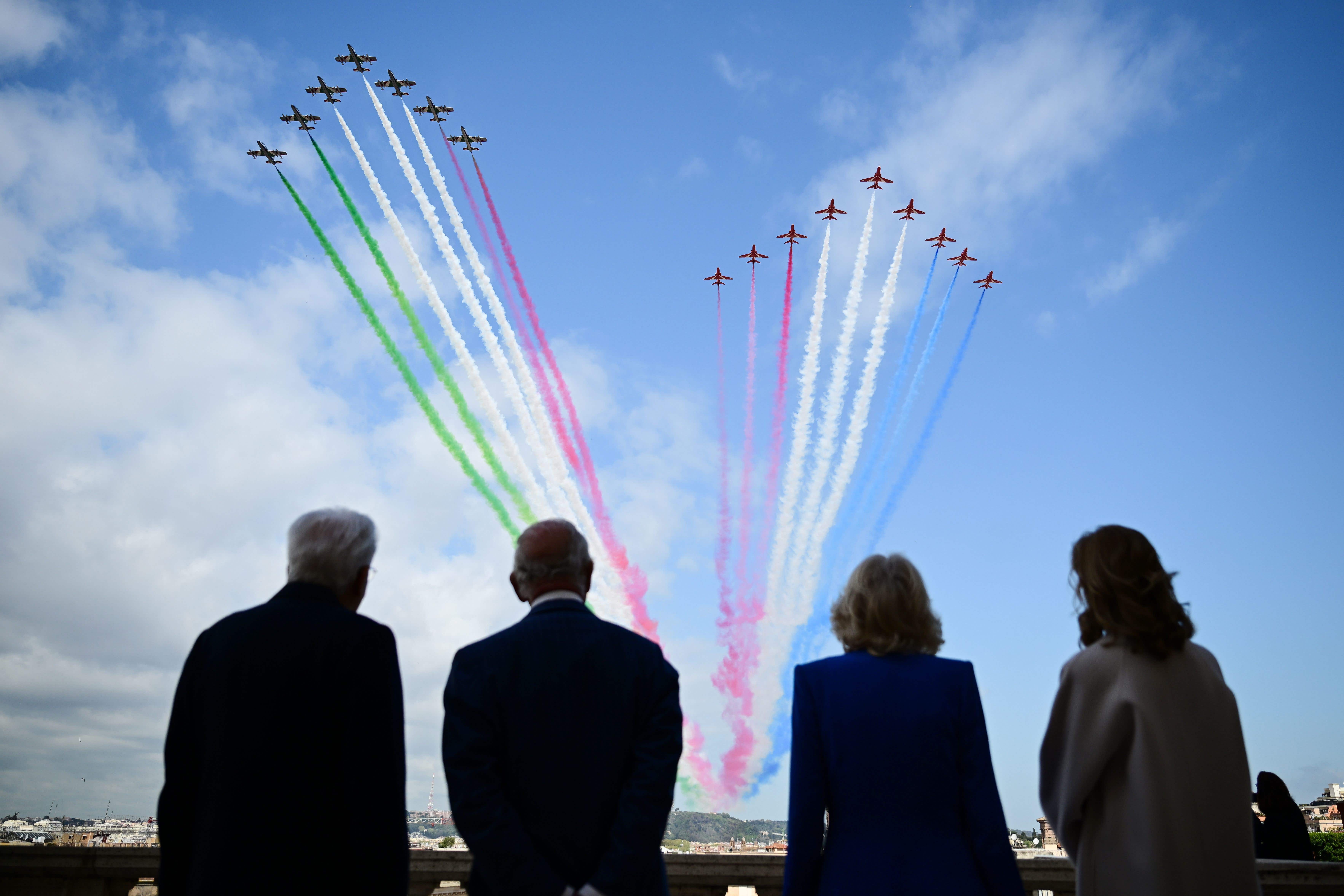 Charles and Camilla with Italian President Sergio Mattarella and the president’s daughter, Laura, during a flypast by the Frecce Tricolori and Red Arrows over Rome (Victoria Jones/PA)
