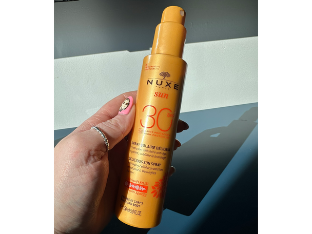 Nuxe testing shots for body suncreens indybest