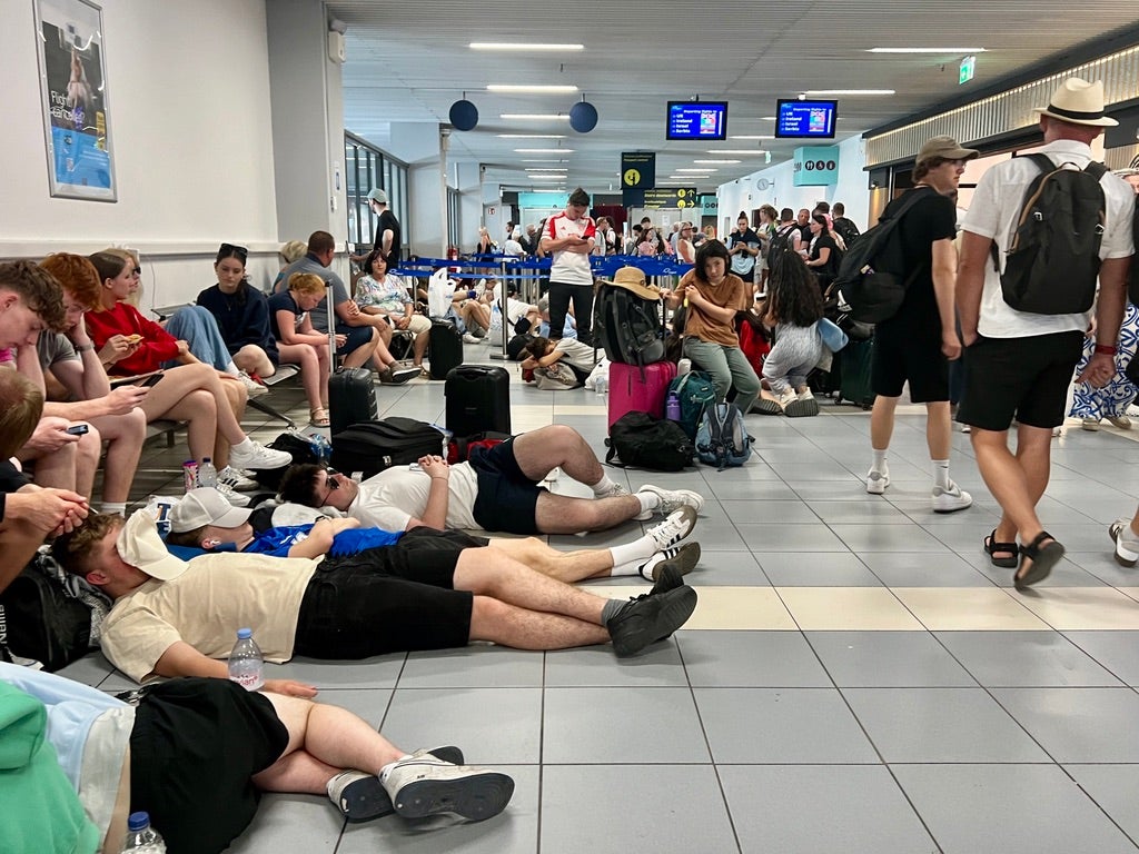 Waiting game: Passengers at the Greek airport of Zante in the summer of 2024