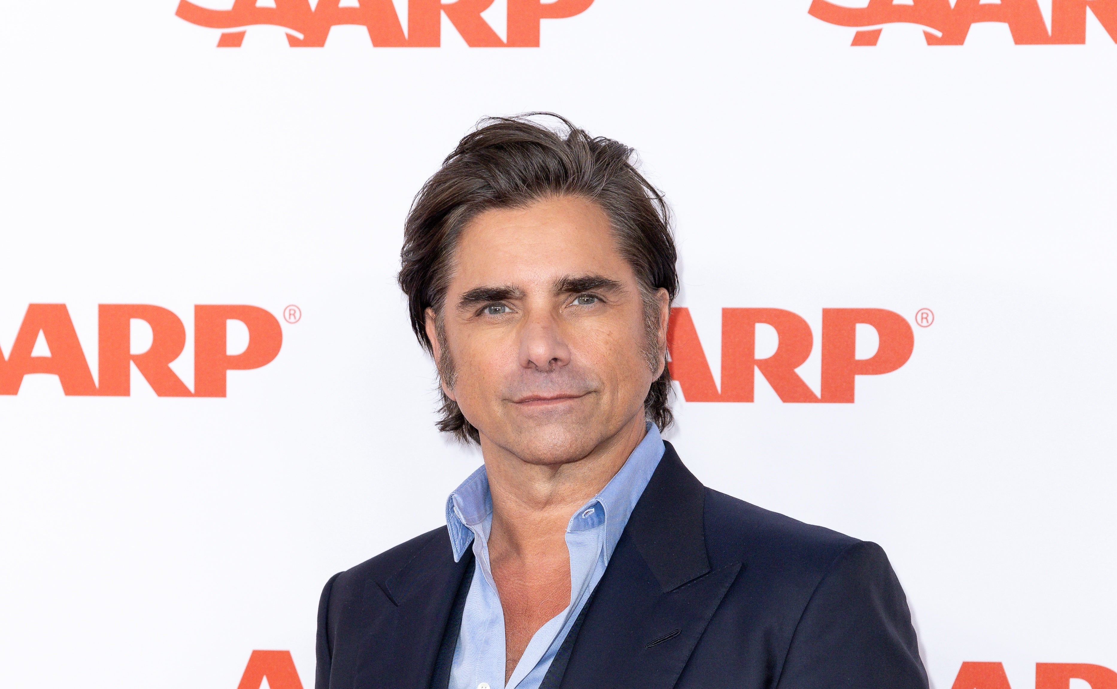 John Stamos says his ‘political views remain unchanged’ after he was spotted at Mar-a-Lago